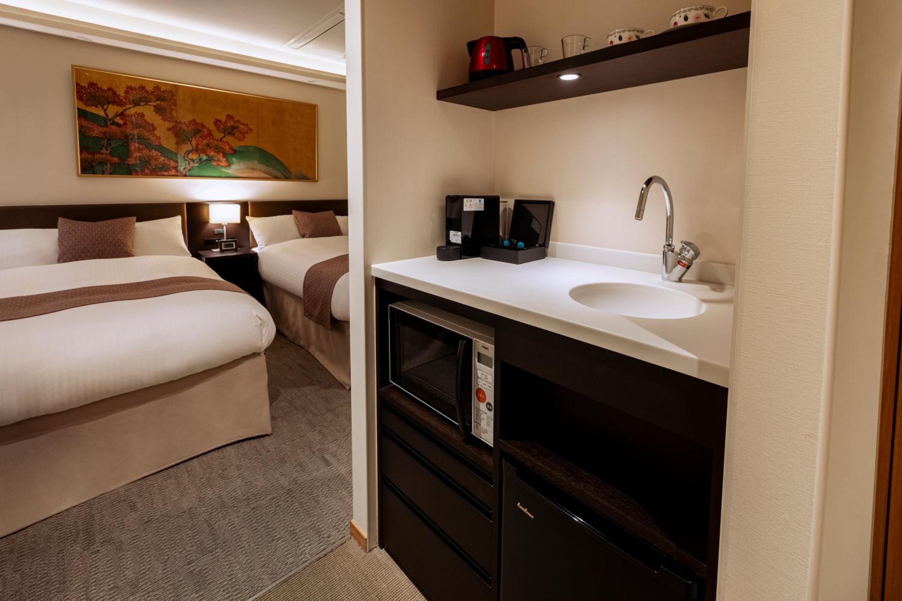 Standard Twin Room - Photo 15