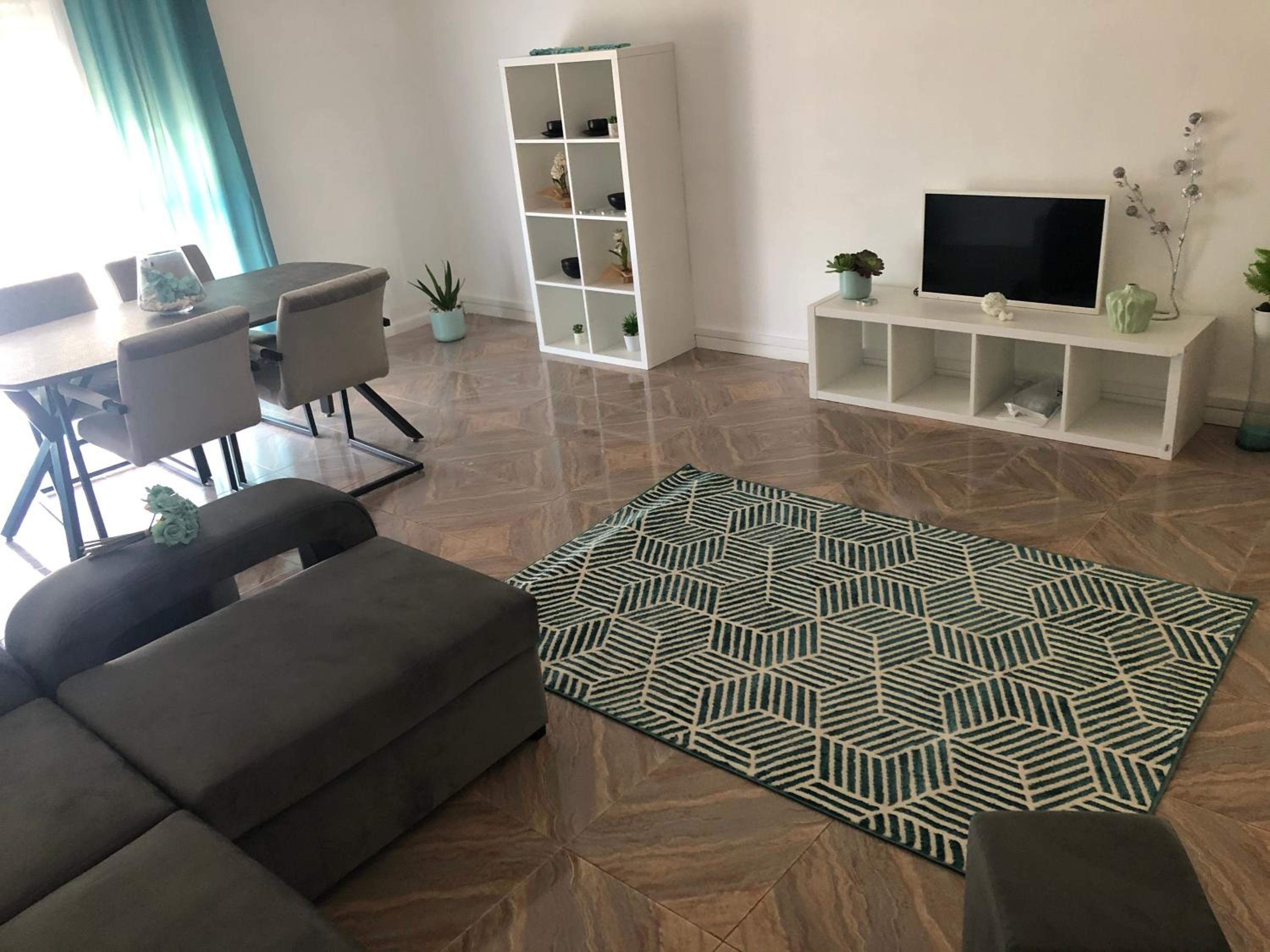 Three-Bedroom Apartment photo 1