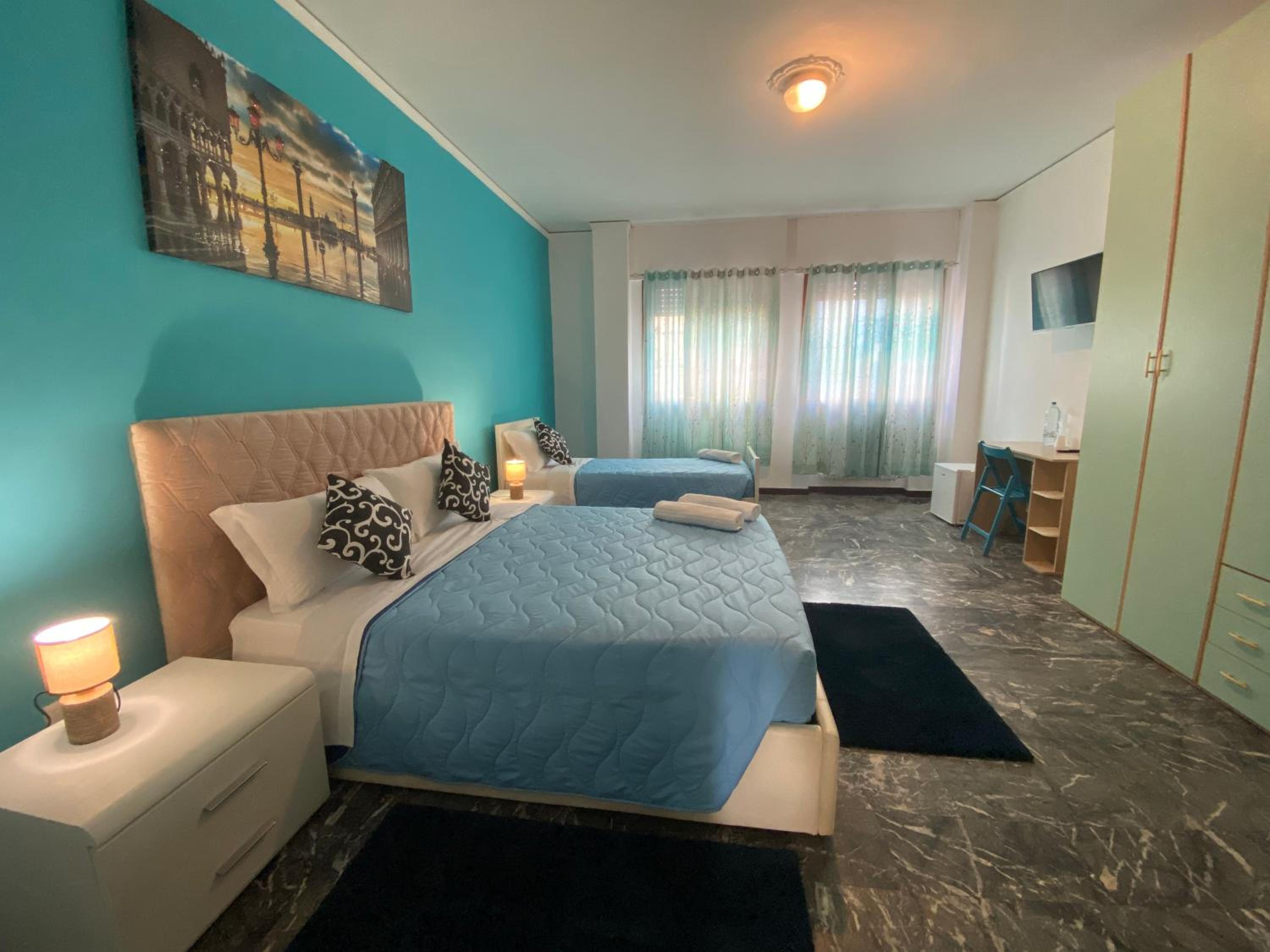 Quadruple Room with Shared Bathroom