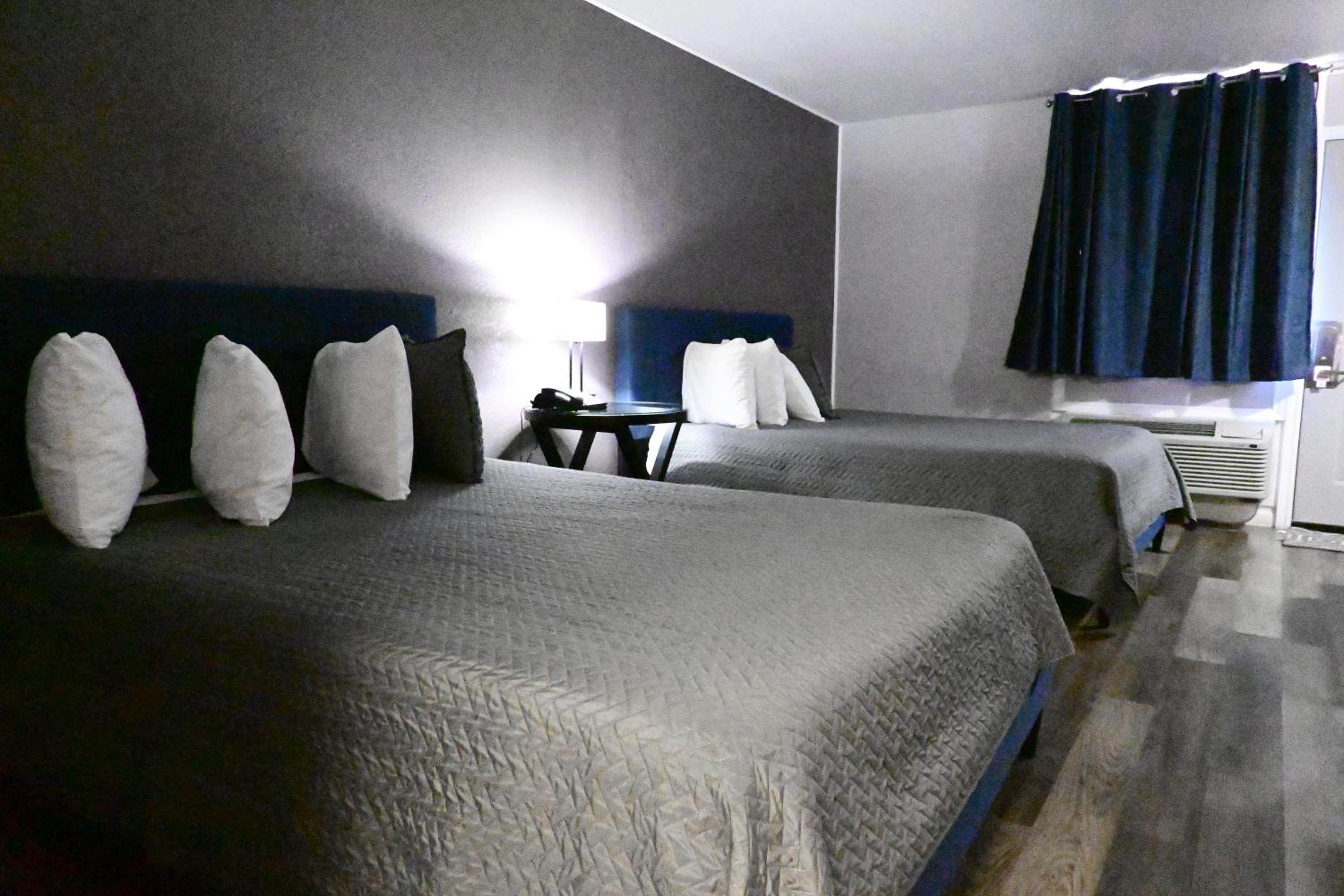 Deluxe Queen Room with Two Queen Beds - Photo 1