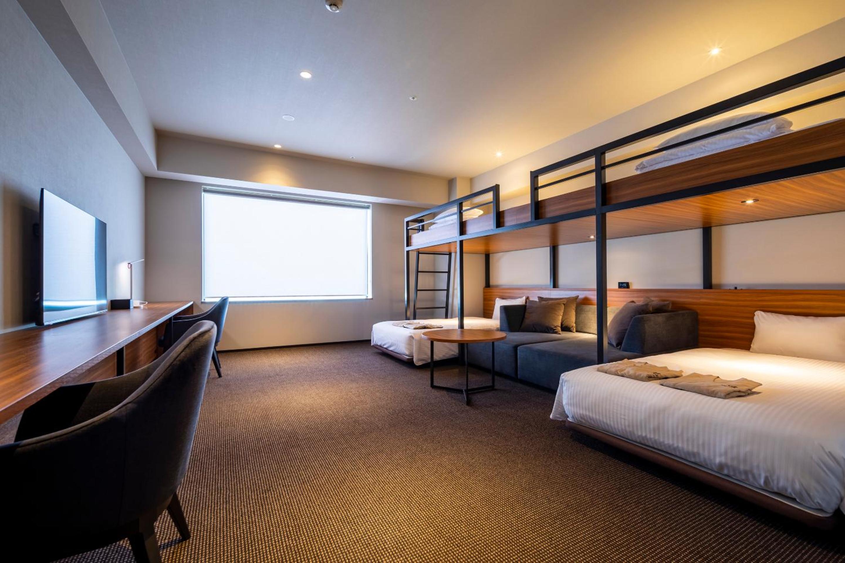 Deluxe Quadruple Room - Photo 1