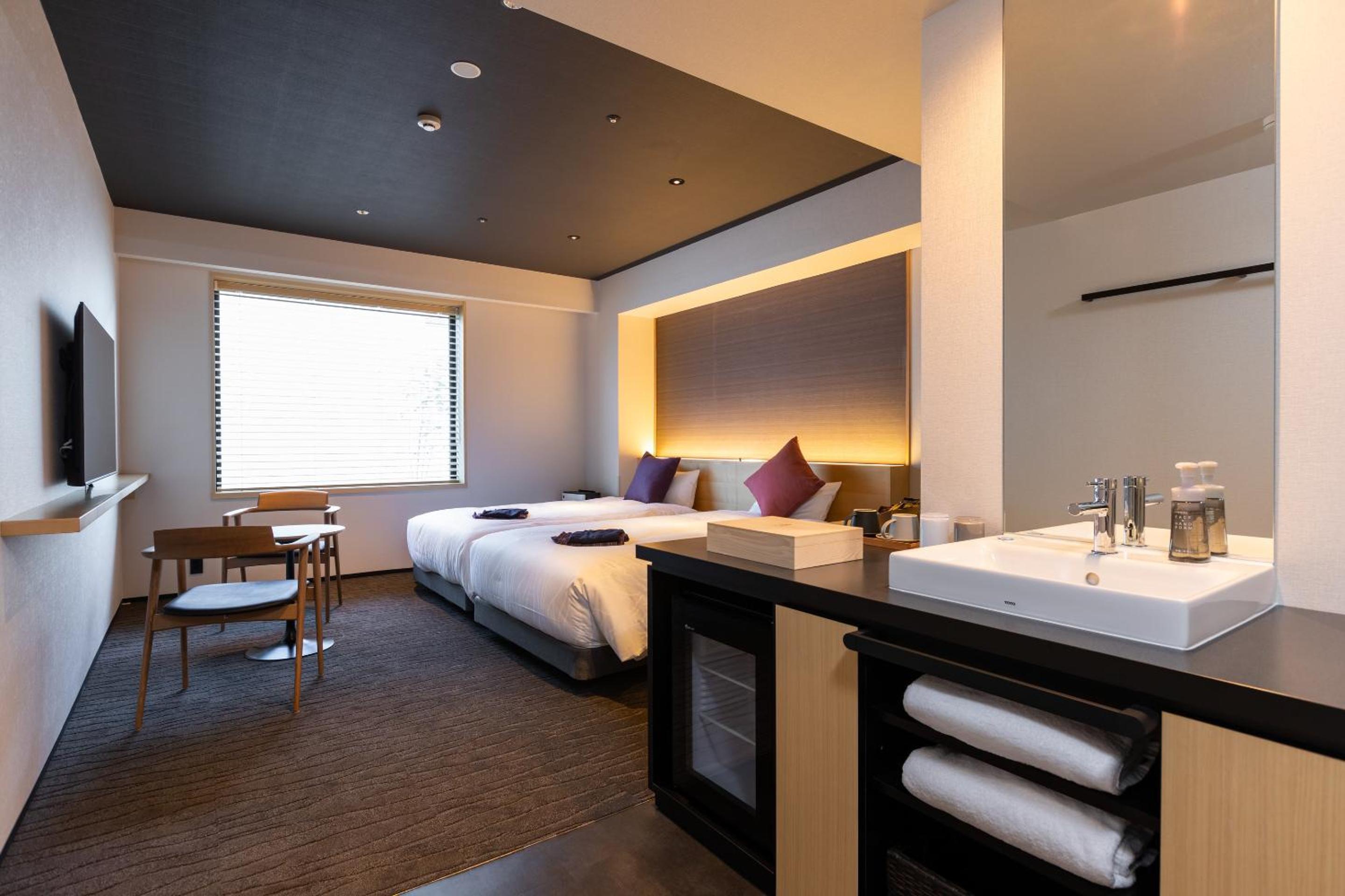Twin Room - Photo 2