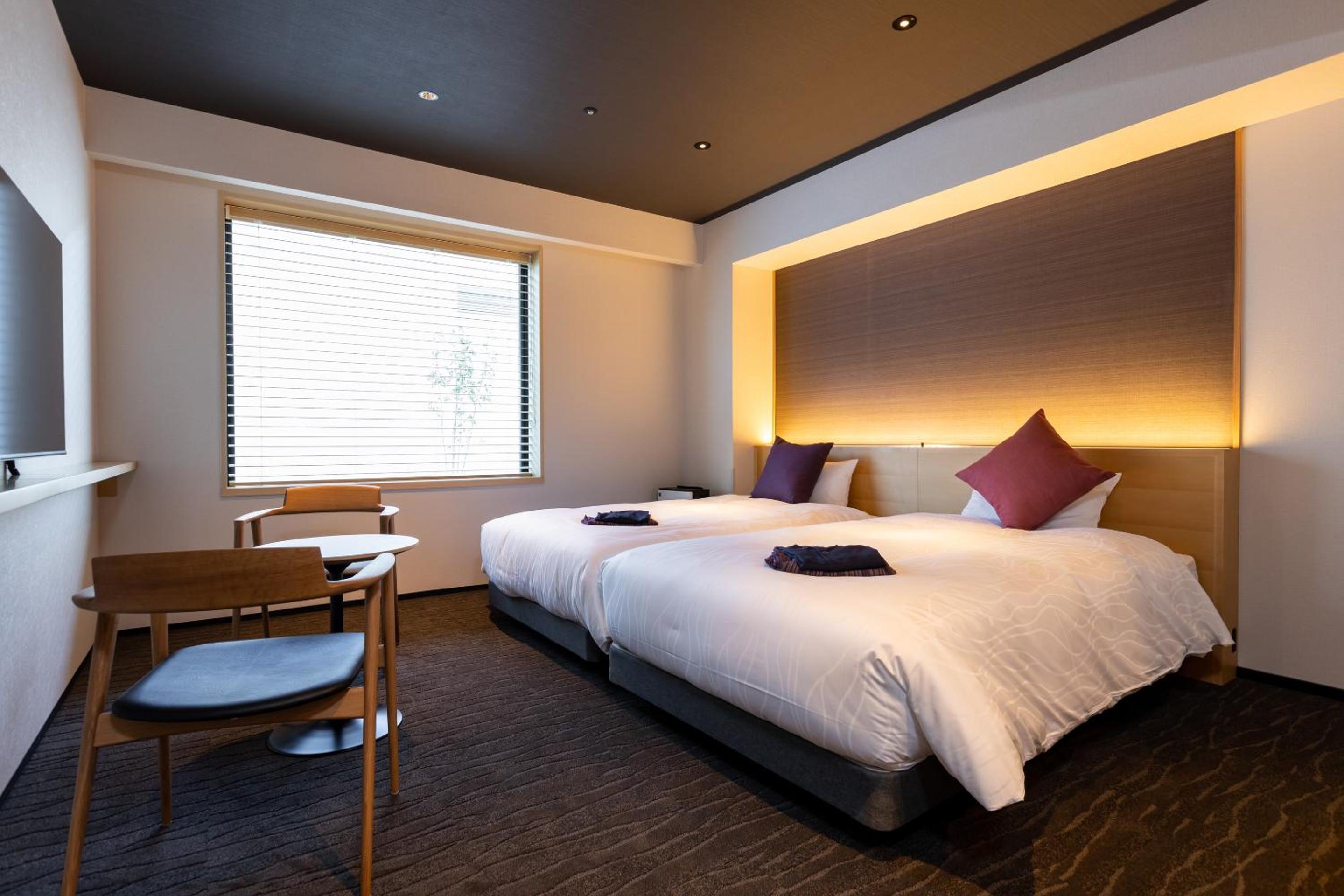 Twin Room - Photo 1