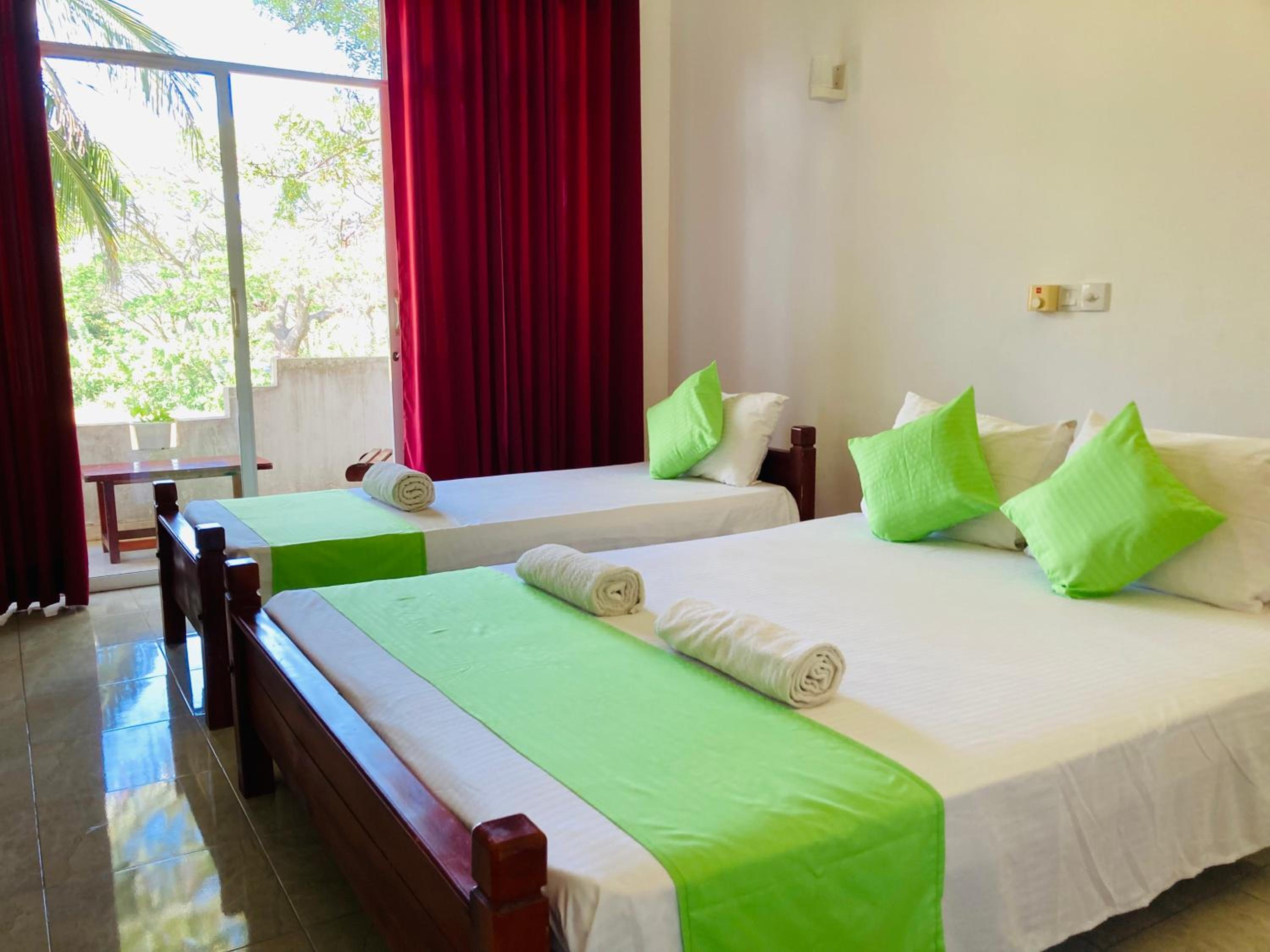 Deluxe Triple Room
