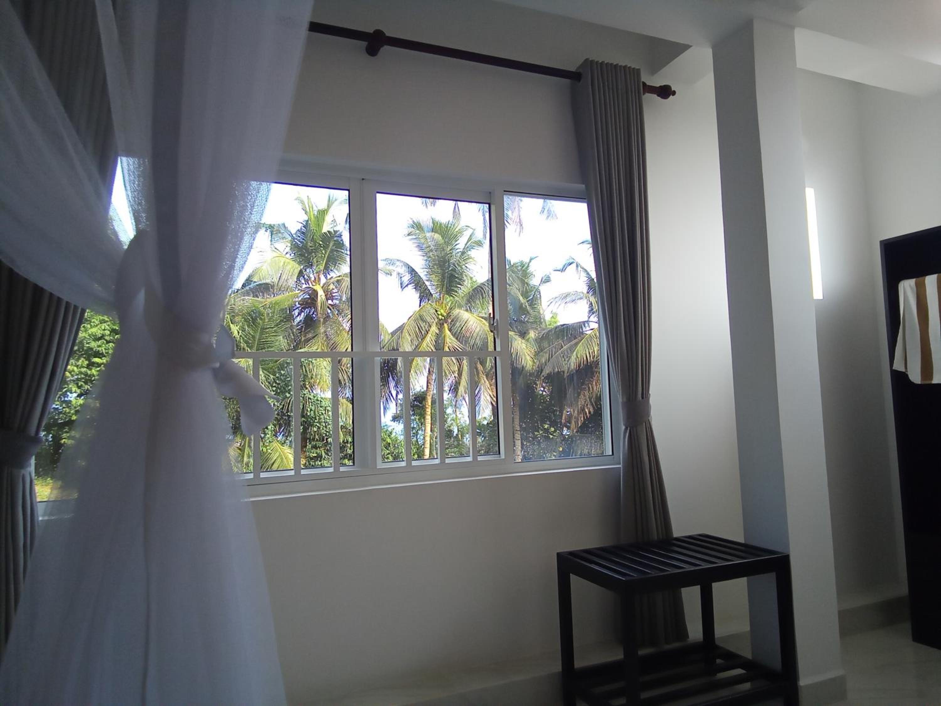 Double Room with Balcony (2 Adults + 1 Child) photo 2