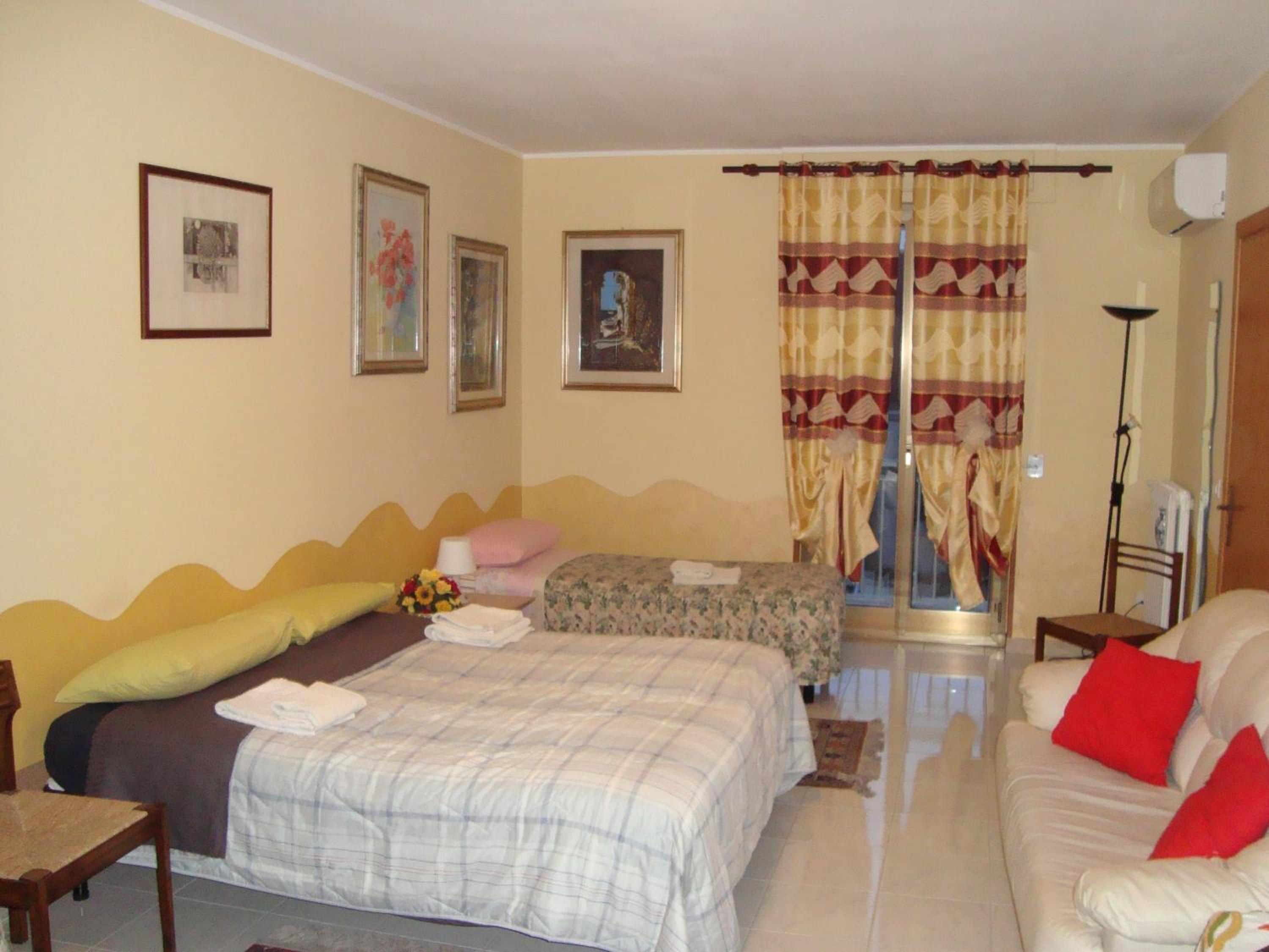 Quadruple Room with Private Bathroom