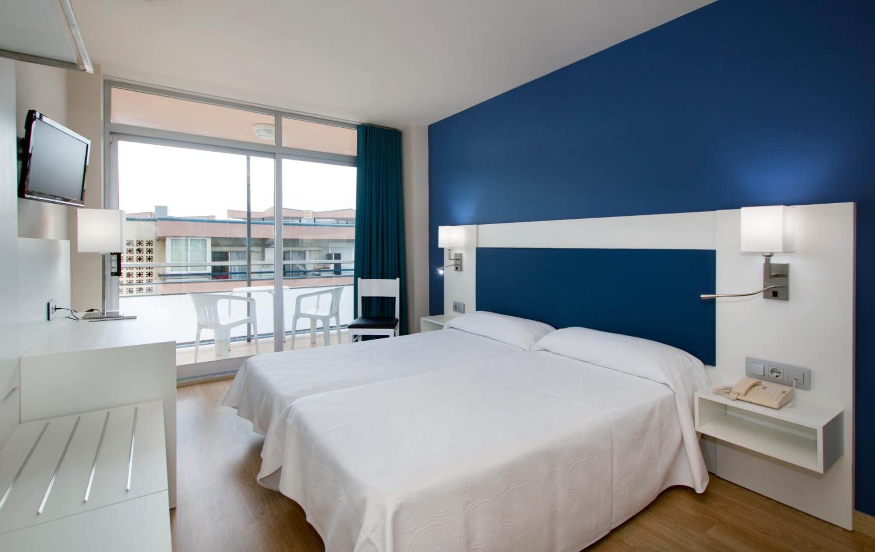 Habitación Cuádruple (2 Adultos + 2 Niños)