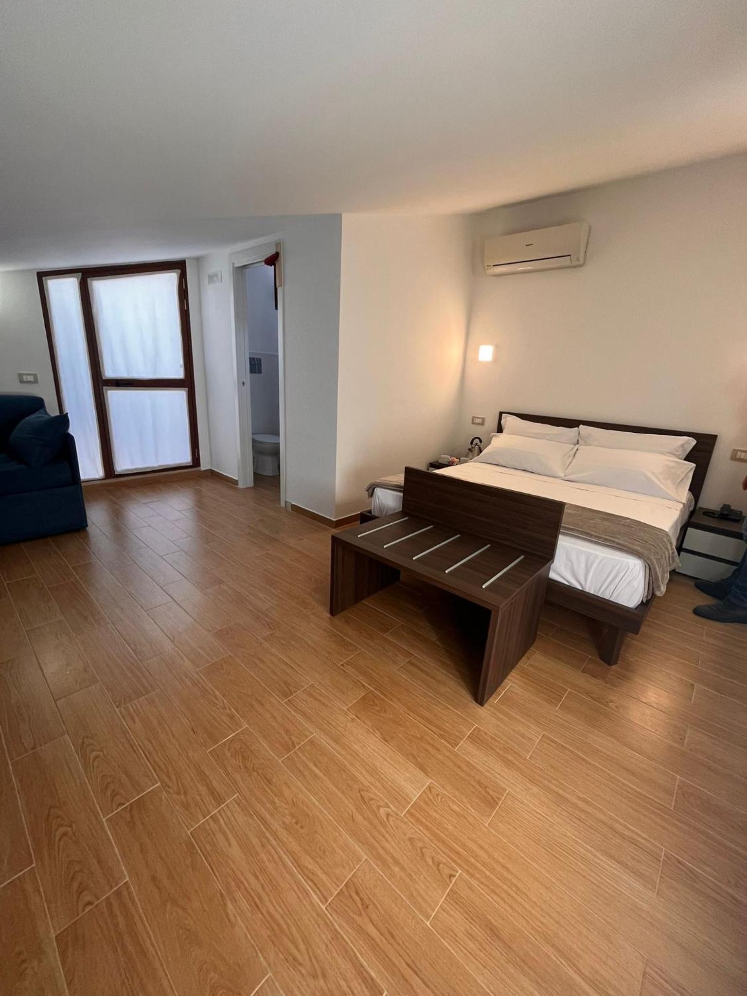 Deluxe Triple Room - Photo 1