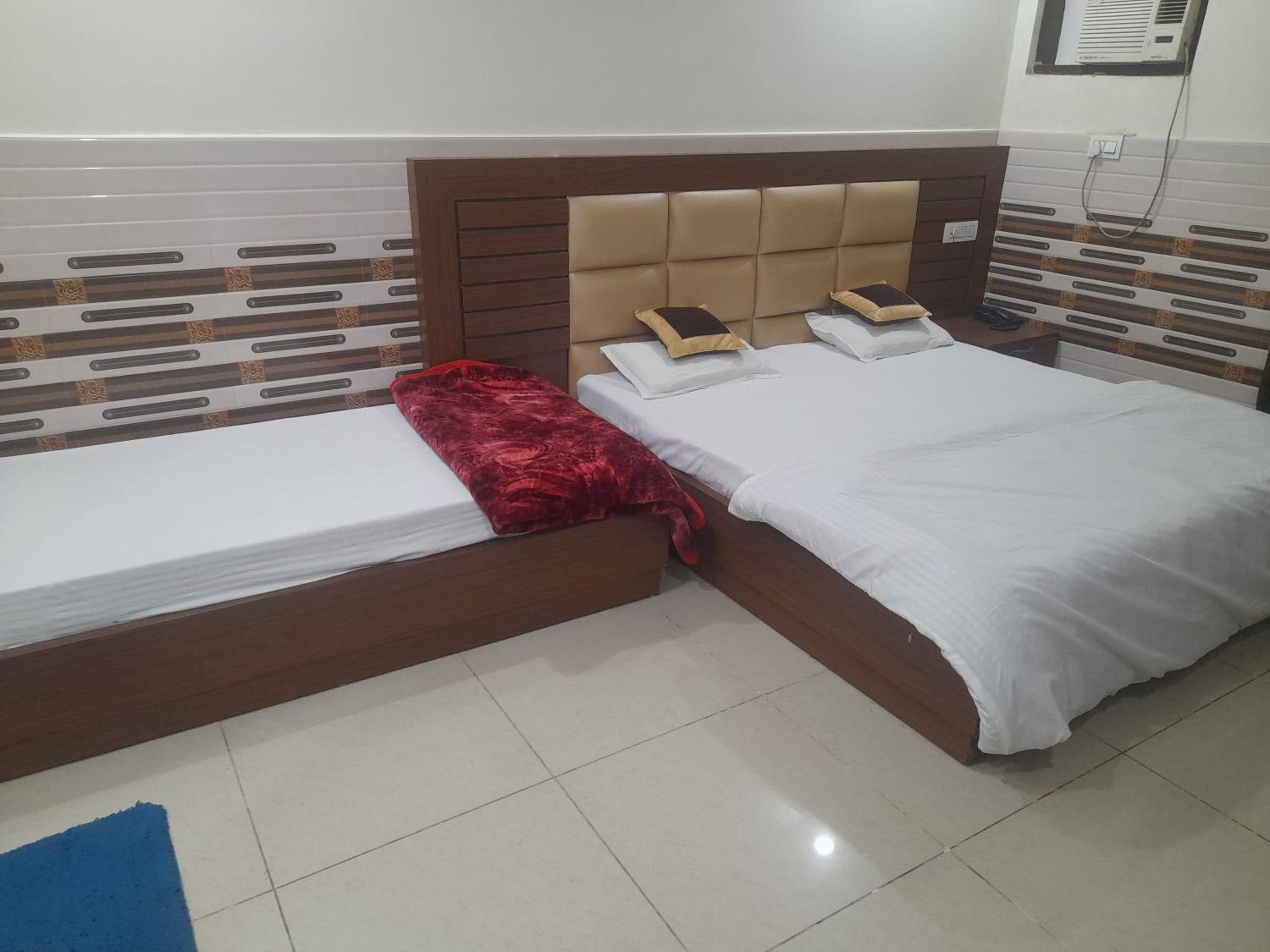 Deluxe Triple Room - Photo 10