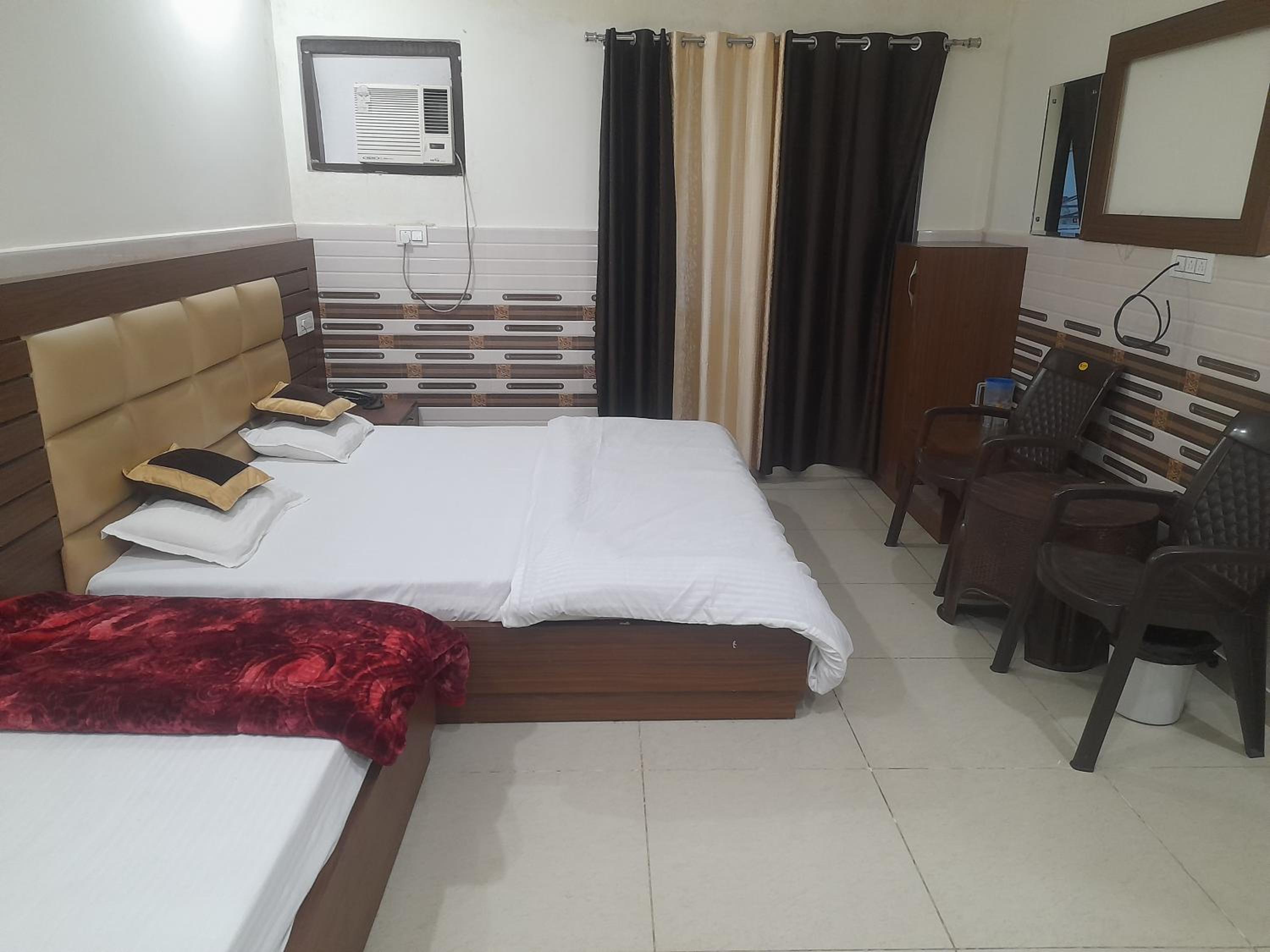 Deluxe Triple Room - Photo 9