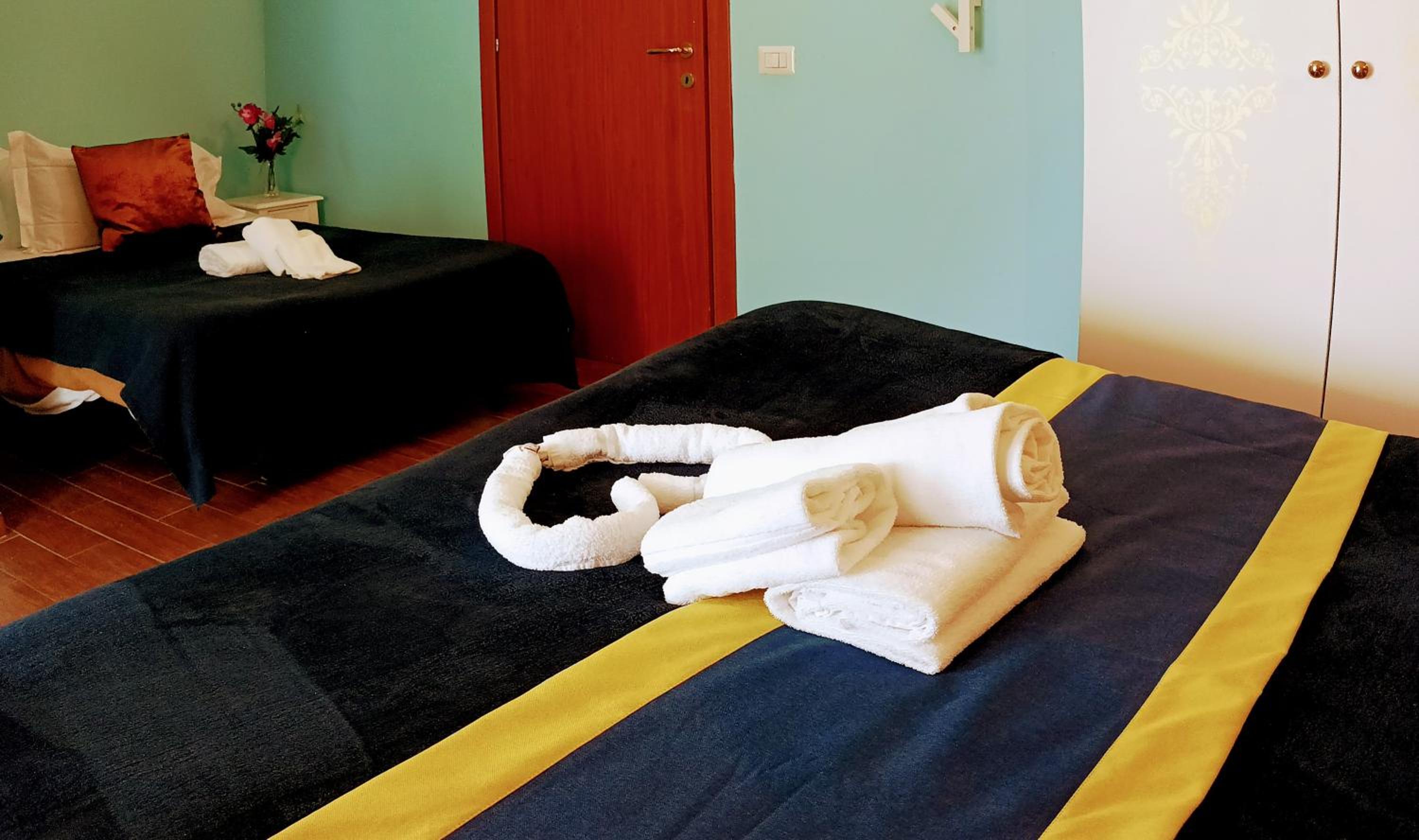 Deluxe Triple Room - Photo 10