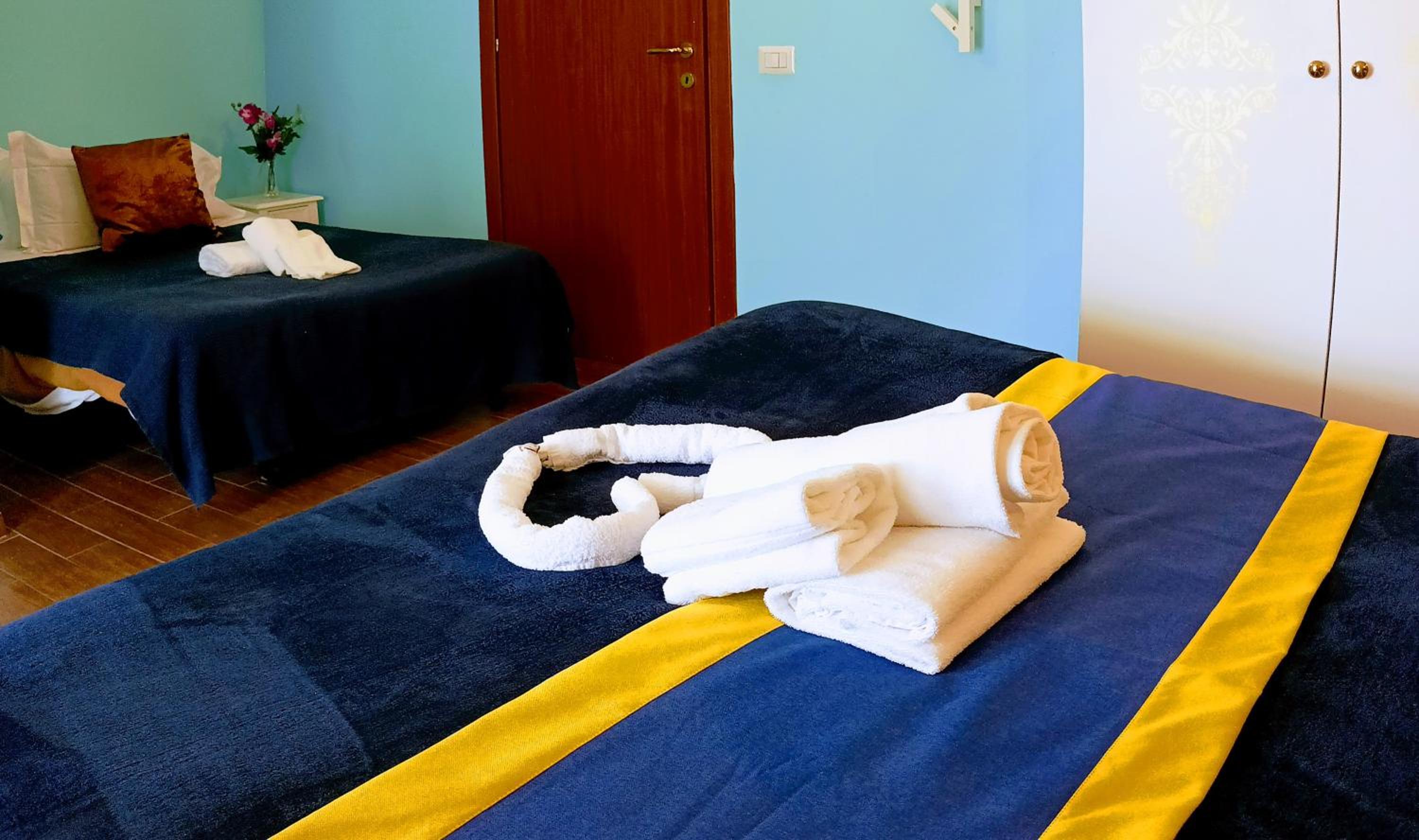 Deluxe Triple Room - Photo 12