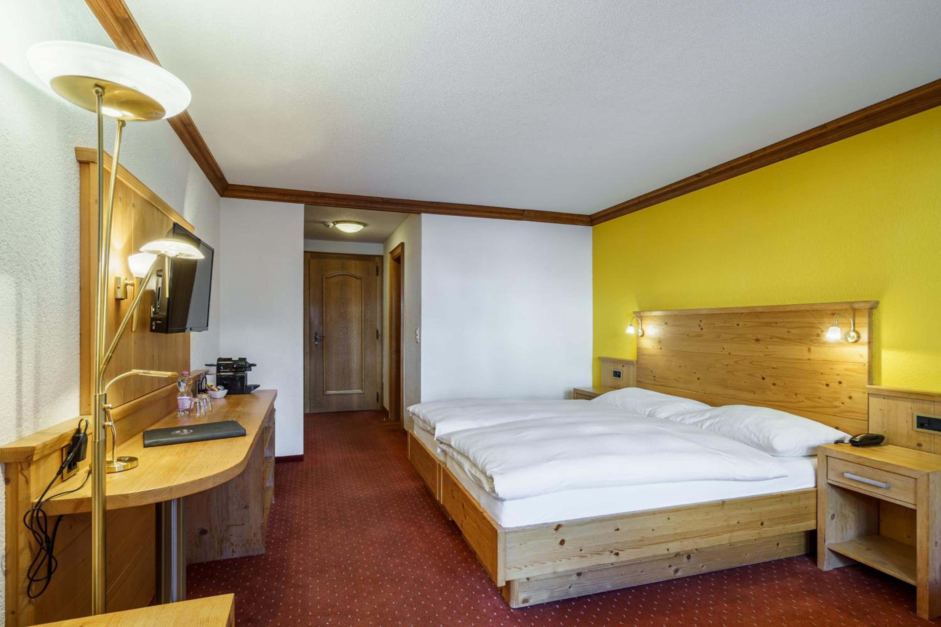 Deluxe Double Room with Matterhorn View and Balcony or Ground Floor Terrace