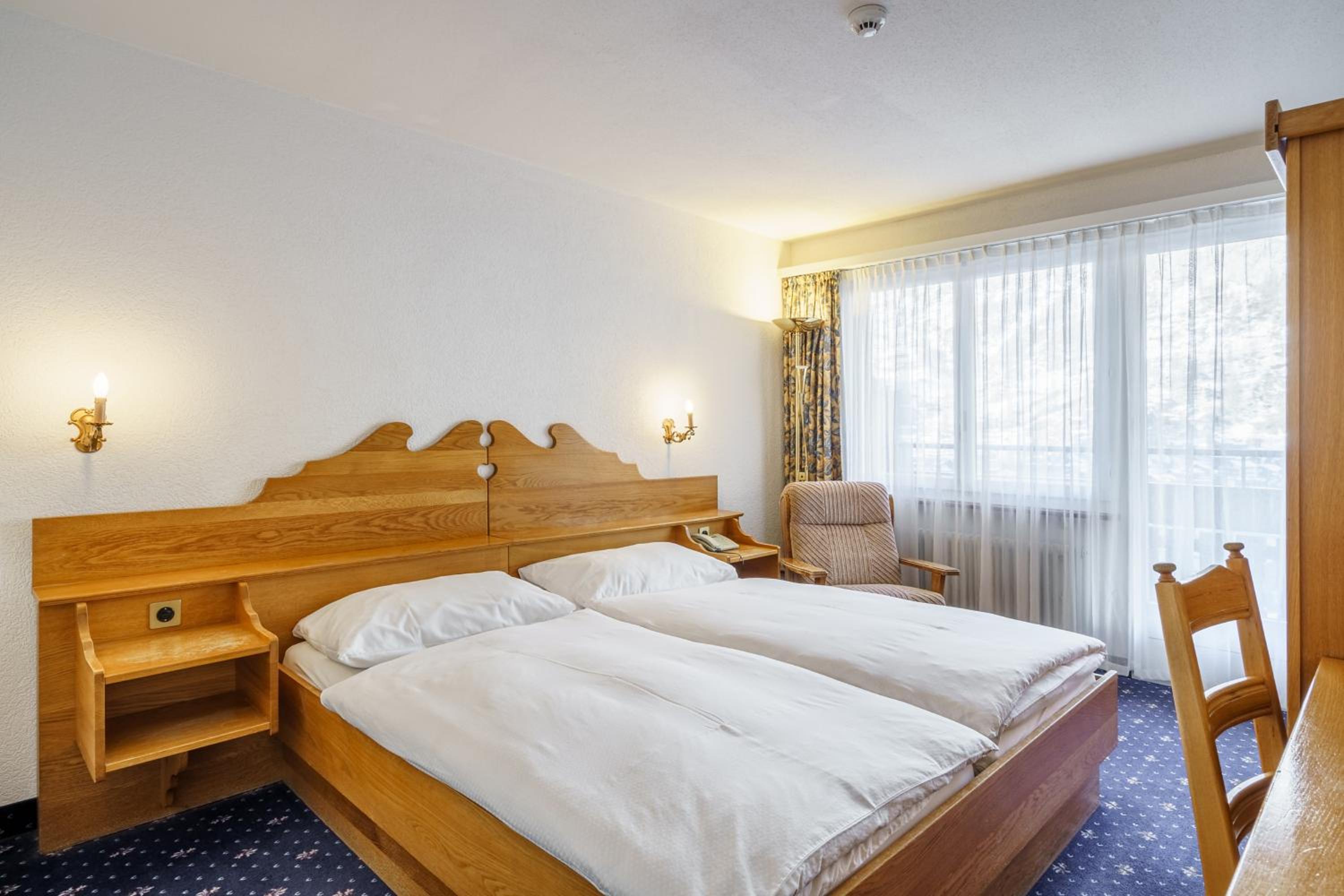 Family Room (2 Adults + 2 Children) with Balcony or Ground Floor Terrace