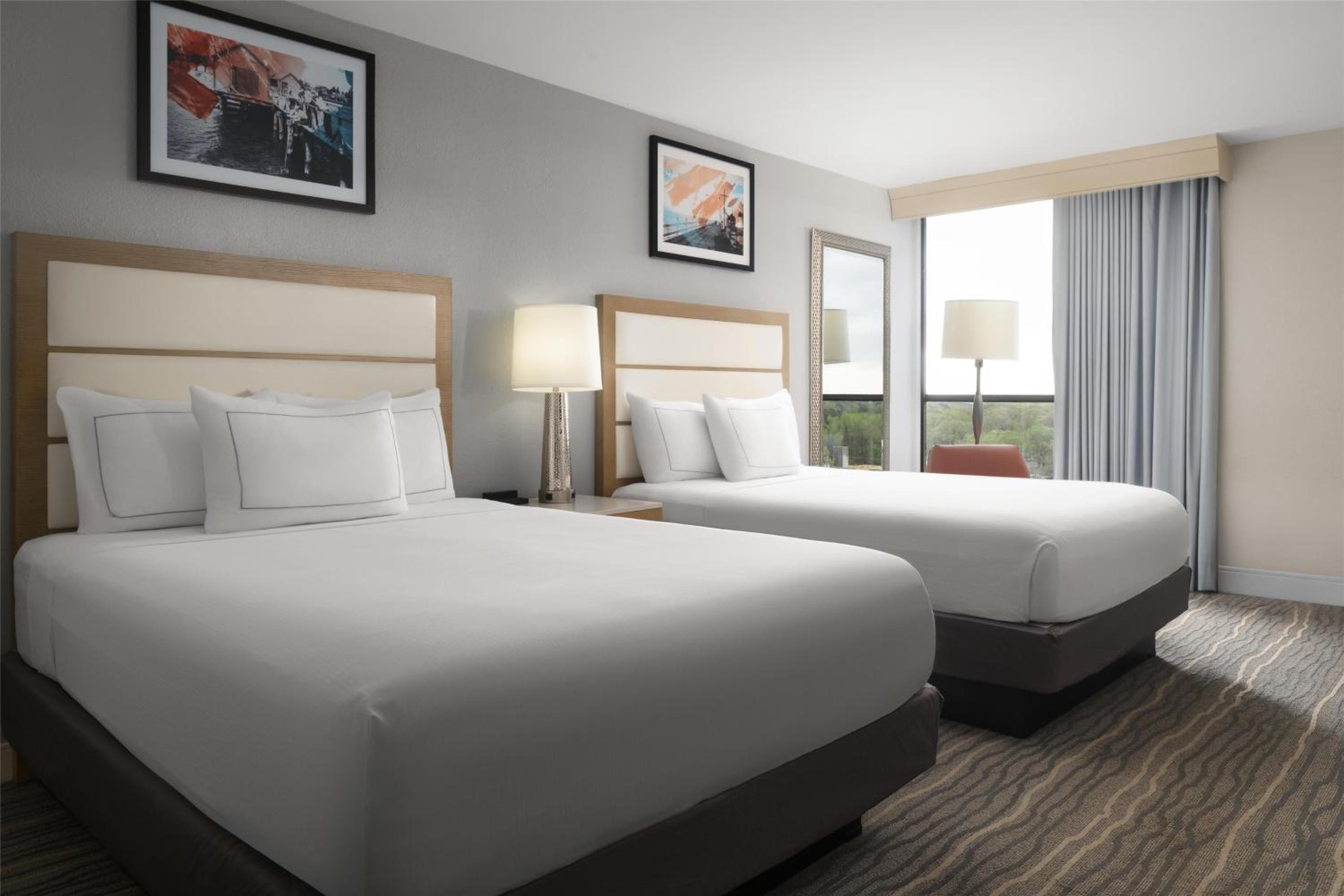 Queen Room with Two Queen Beds and Tub and Shower Combo
