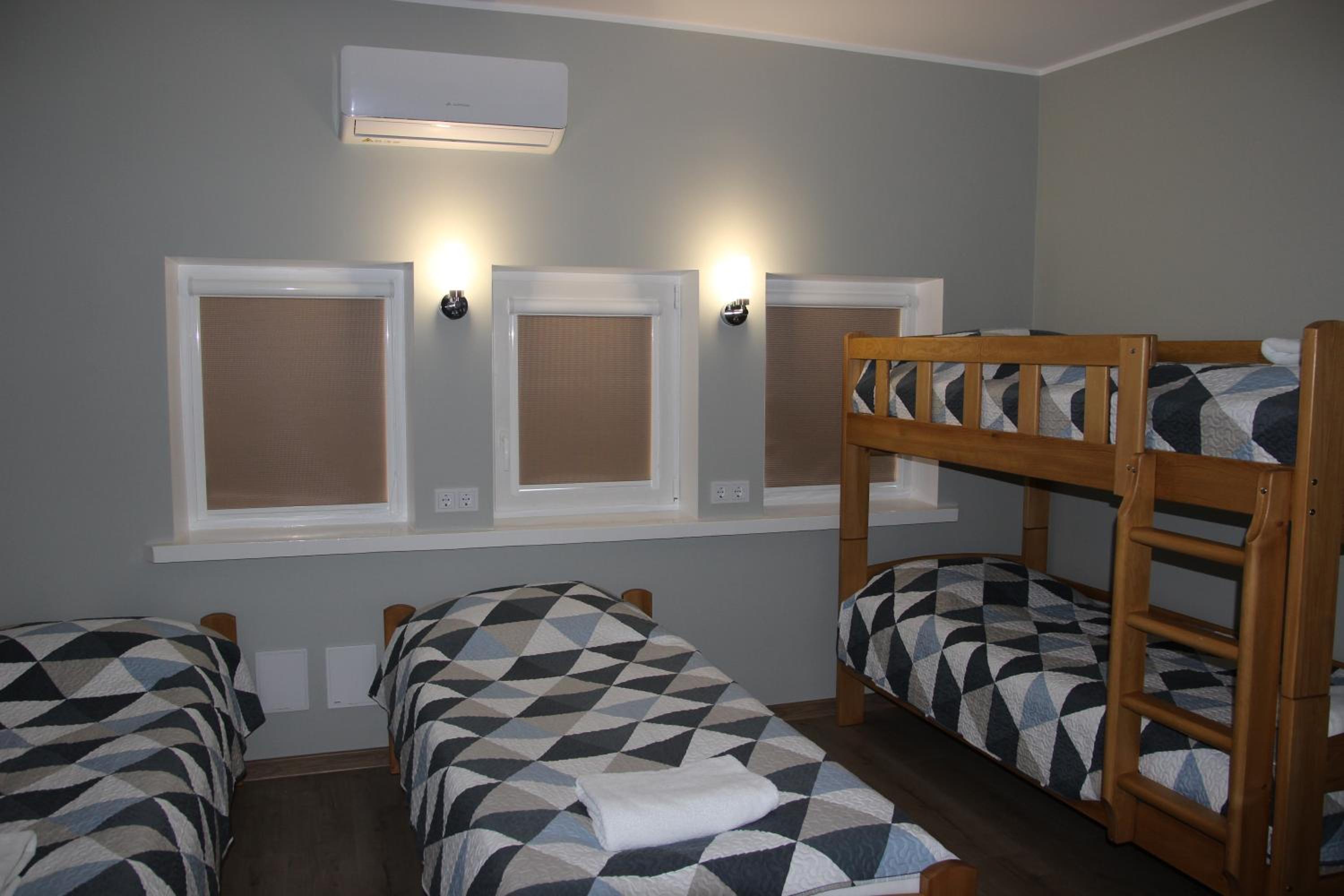 Quadruple Room with Private Bathroom - Photo 1