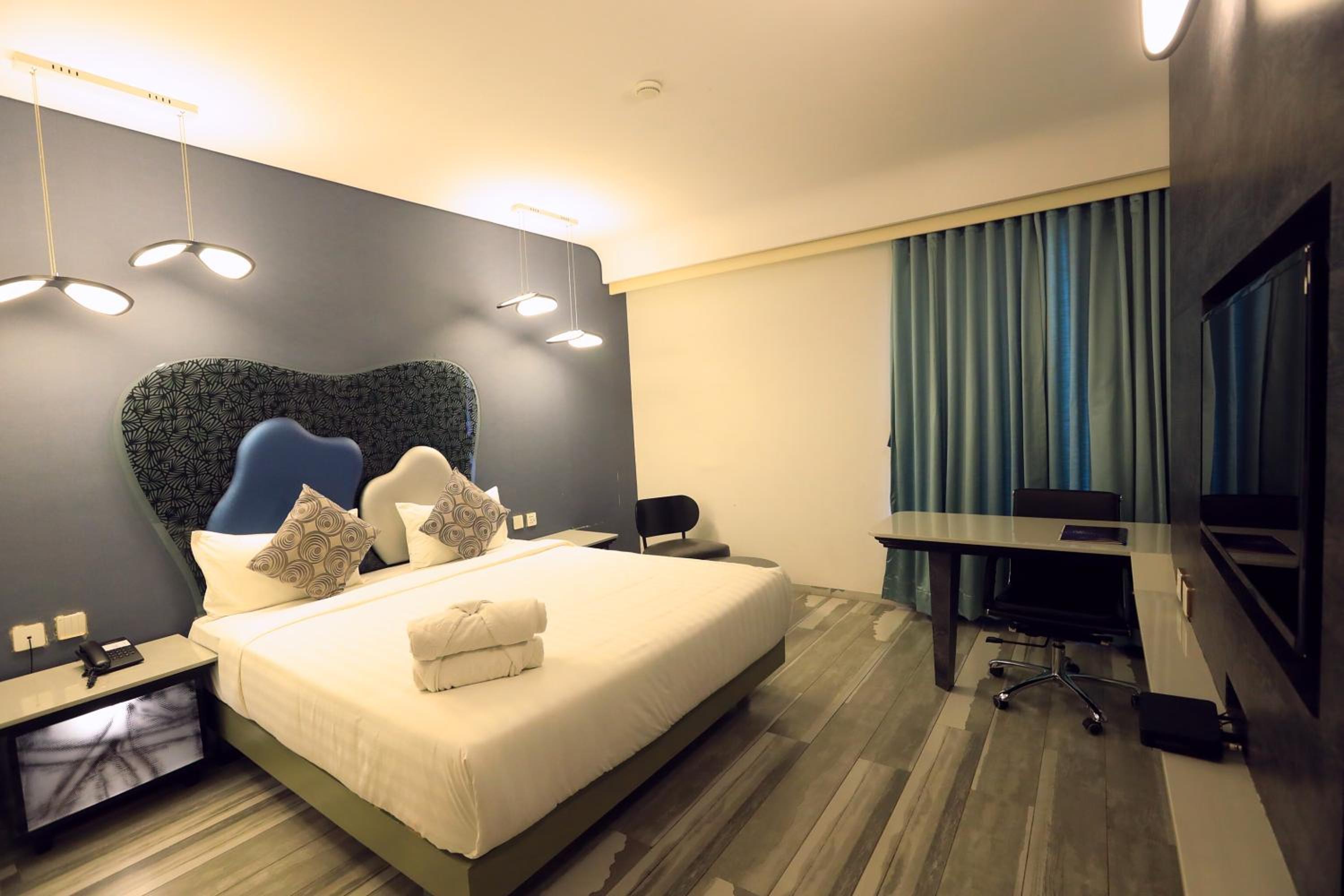 Deluxe Room - Photo 1