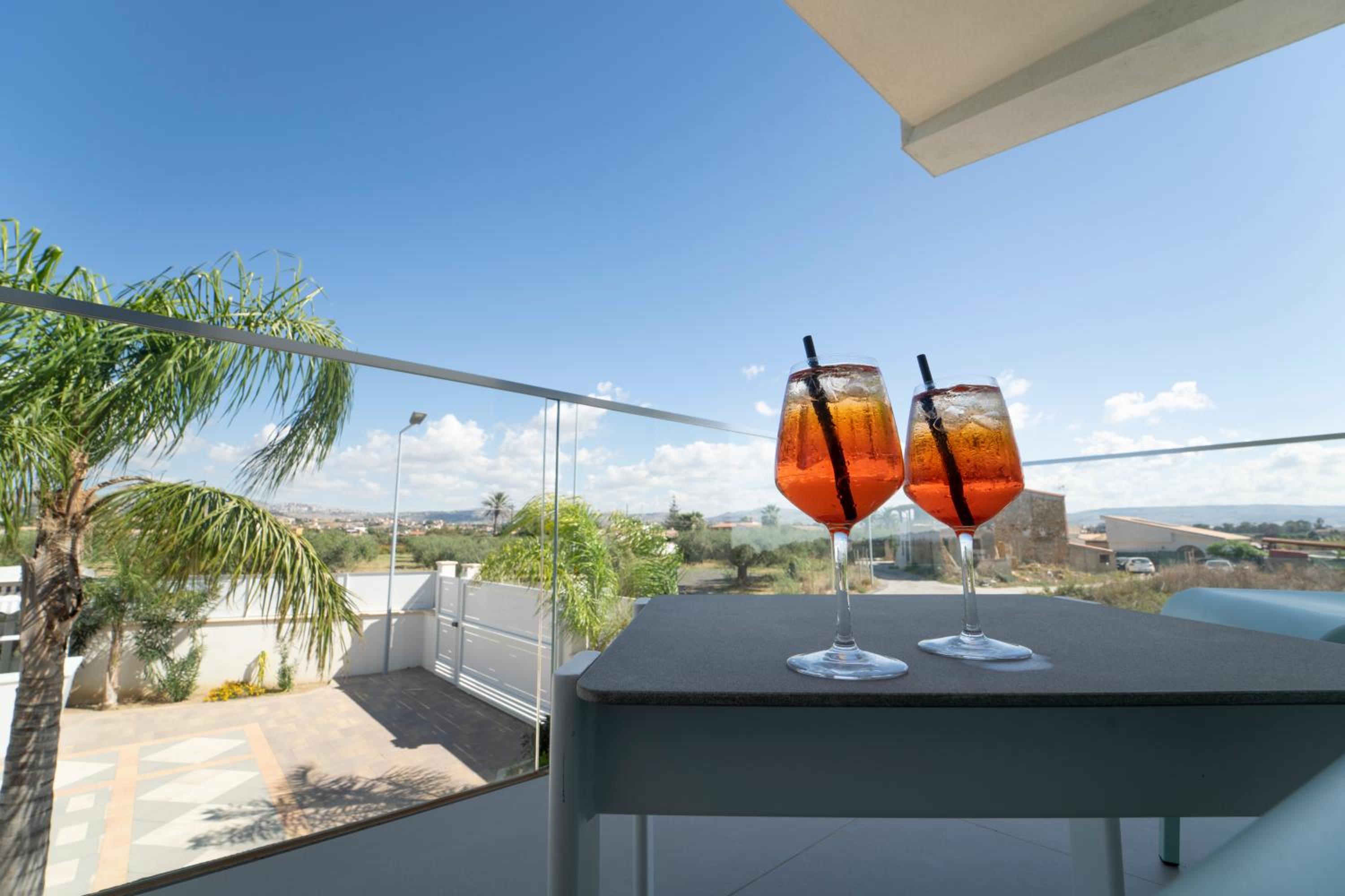Deluxe Double Room with Balcony - Photo 16