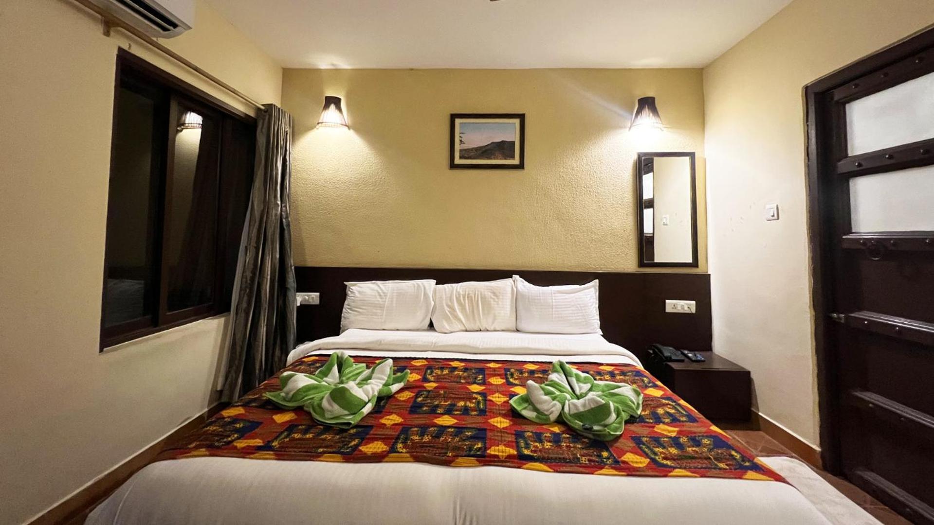 Deluxe Room - Photo 14
