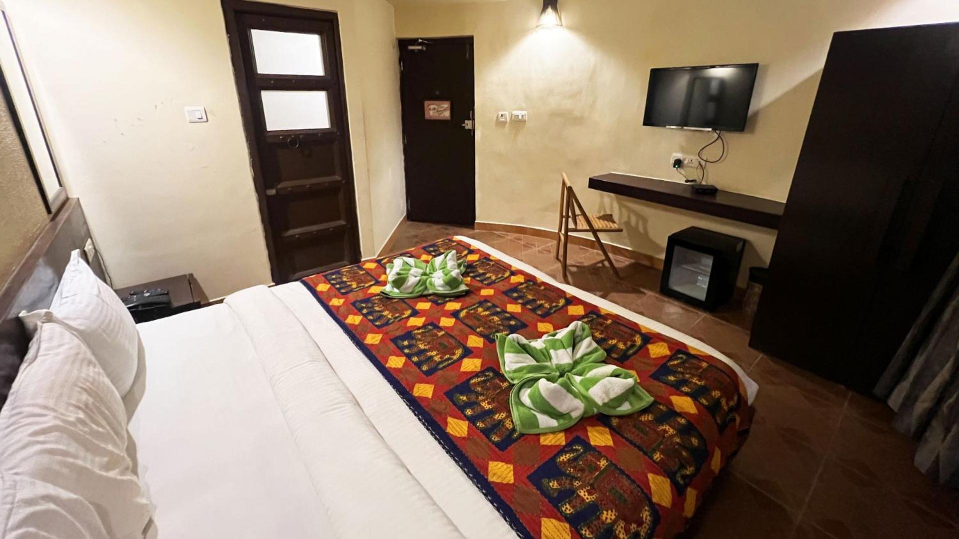 Deluxe Room - Photo 13