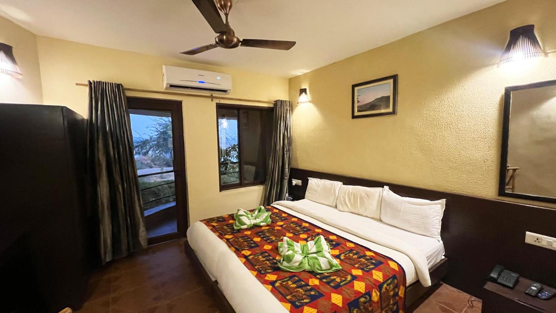 Deluxe Room - Photo 12