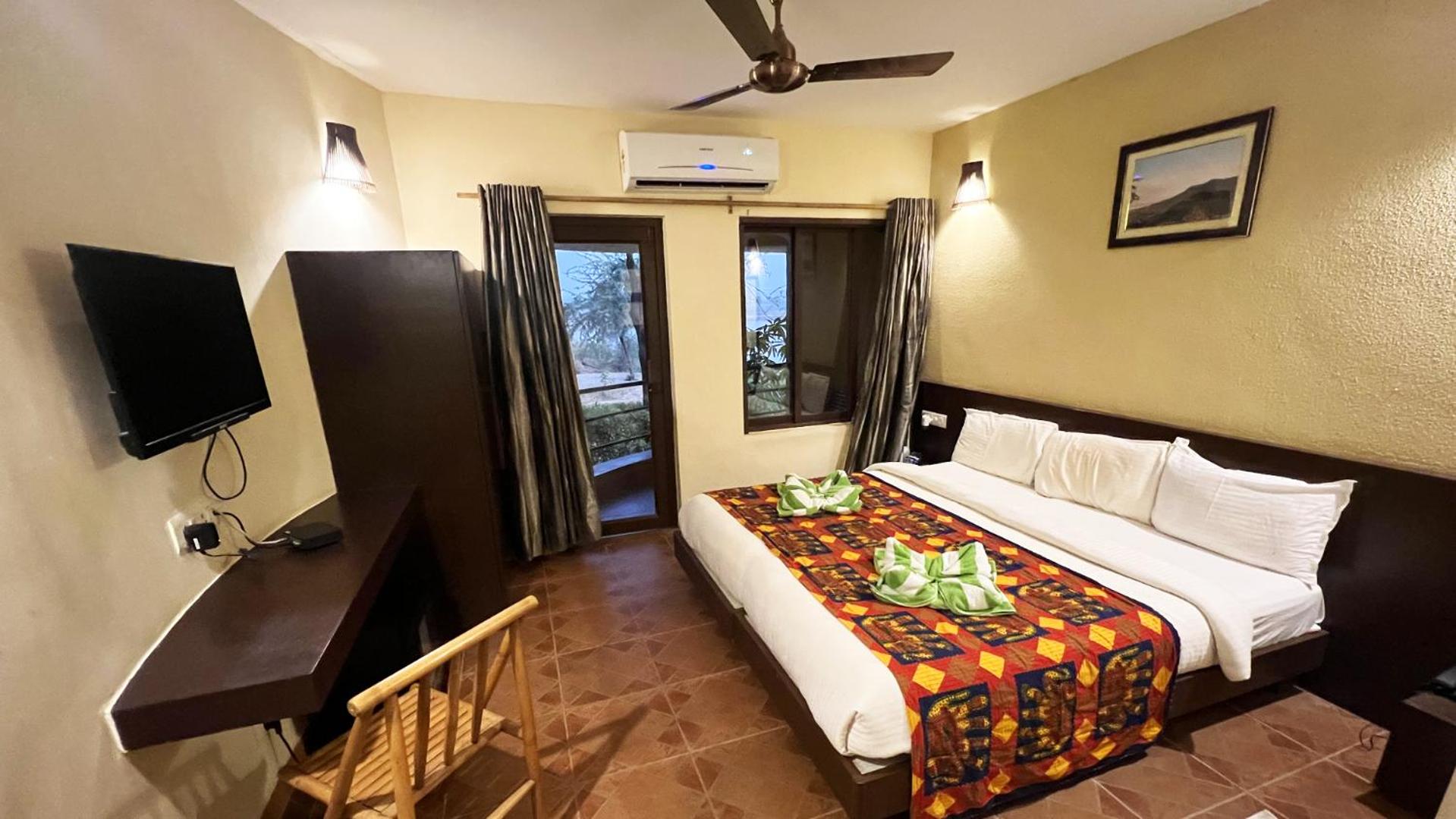 Deluxe Room - Photo 15