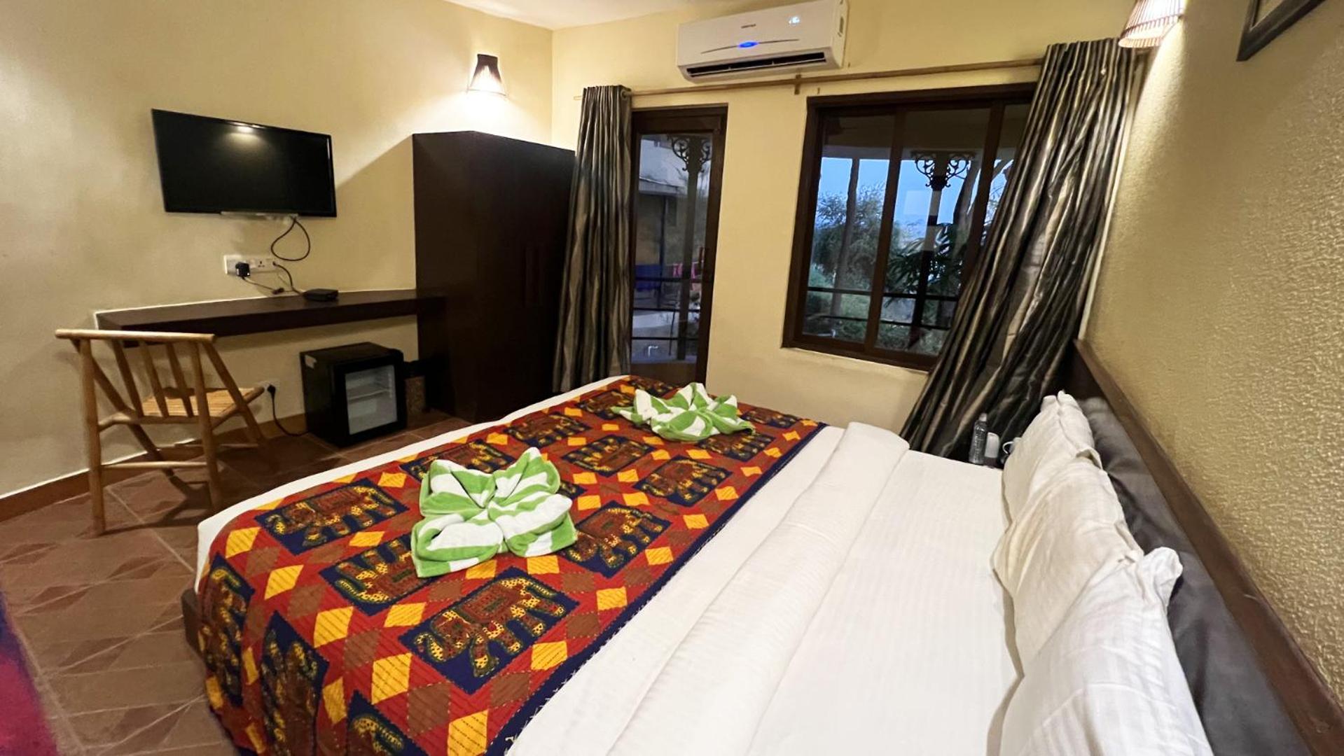 Deluxe Room - Photo 11