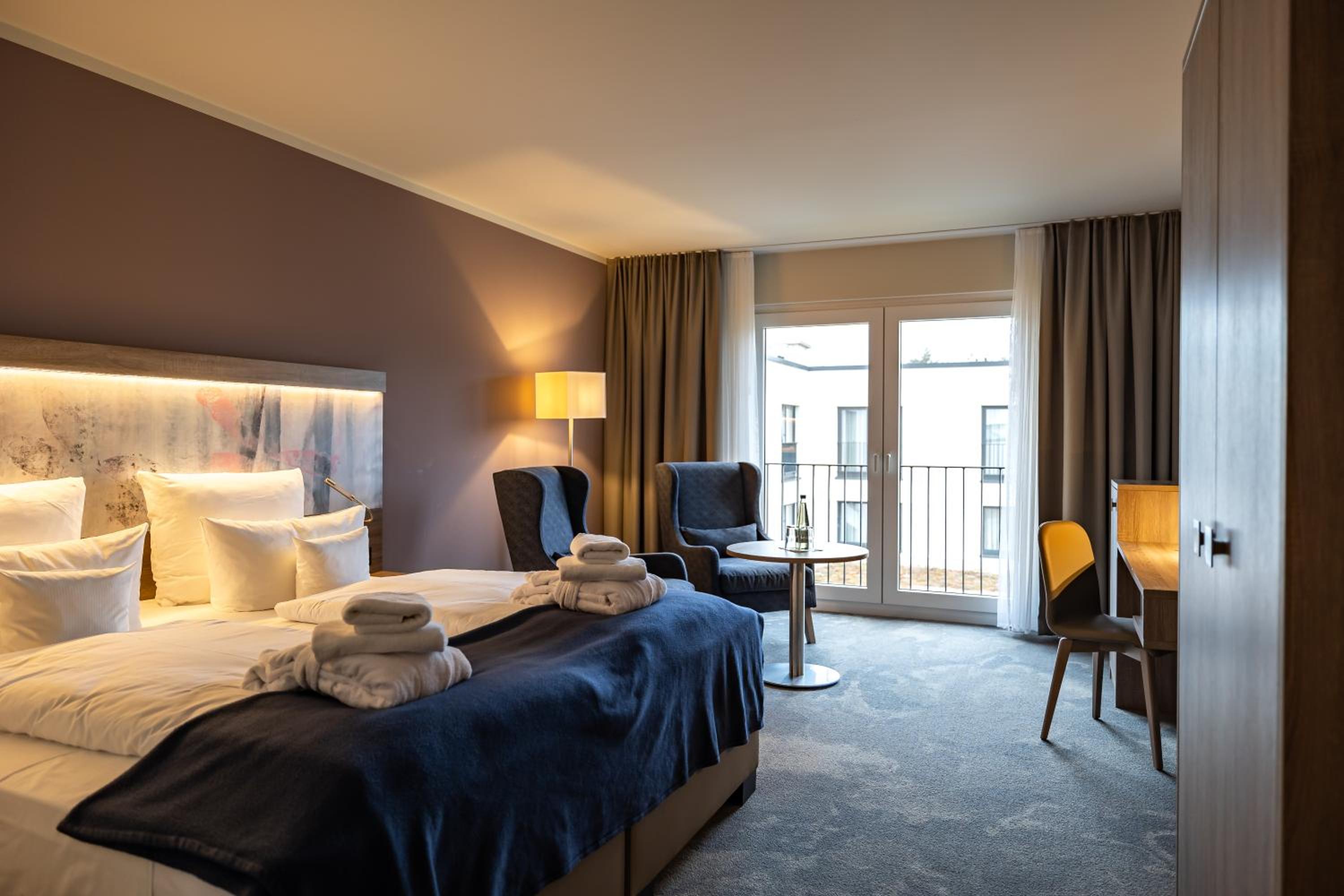 Double Room with Balcony incl.prevention package per Person  photo 3