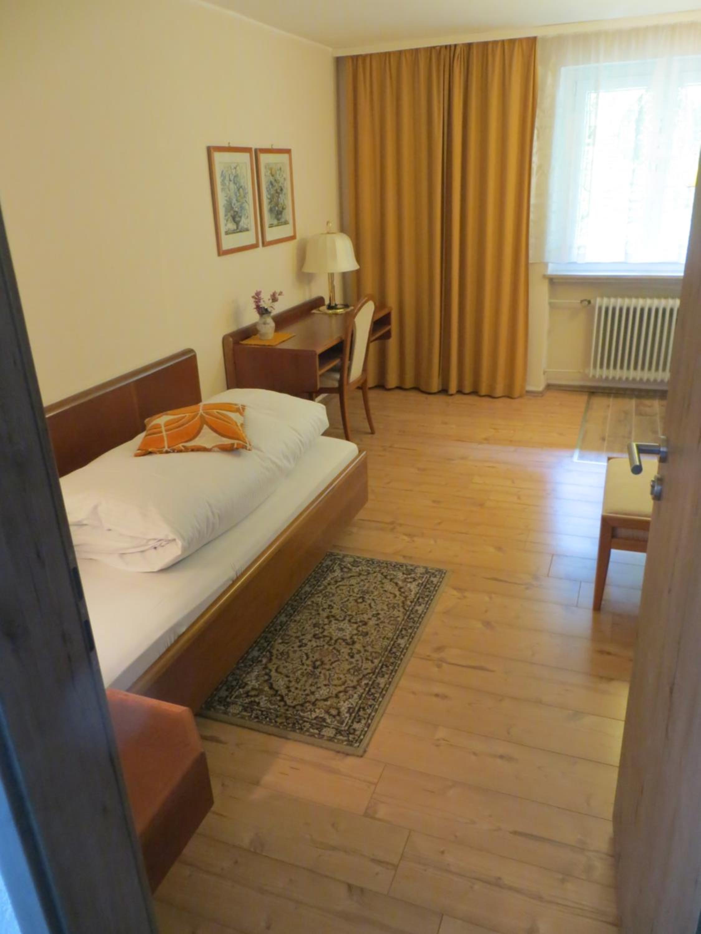Single Room With Shared Shower And Toilet