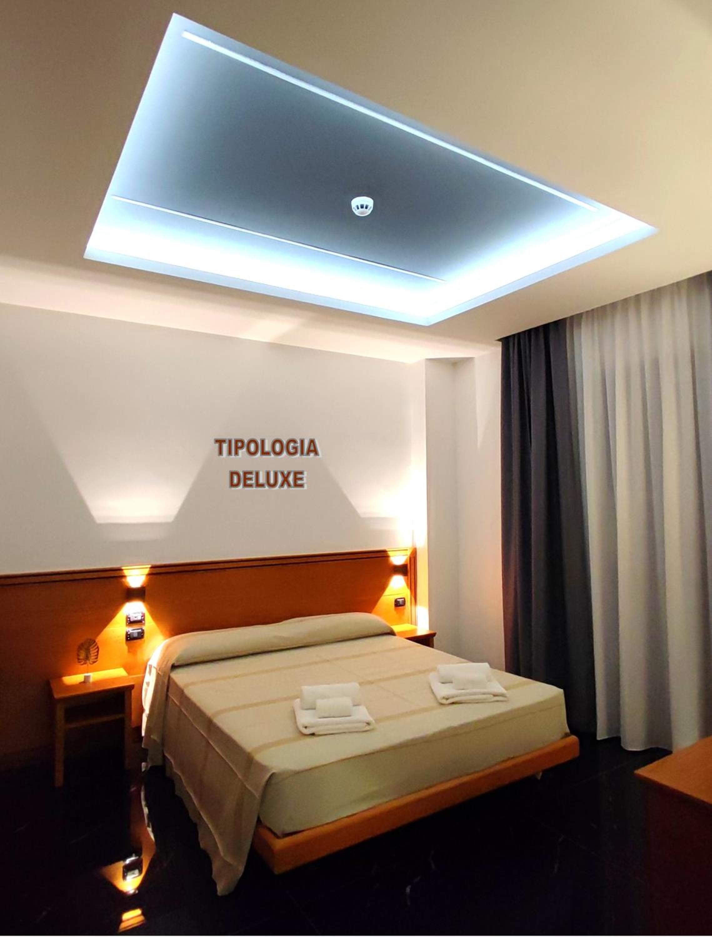Deluxe Quadruple Room - Photo 14