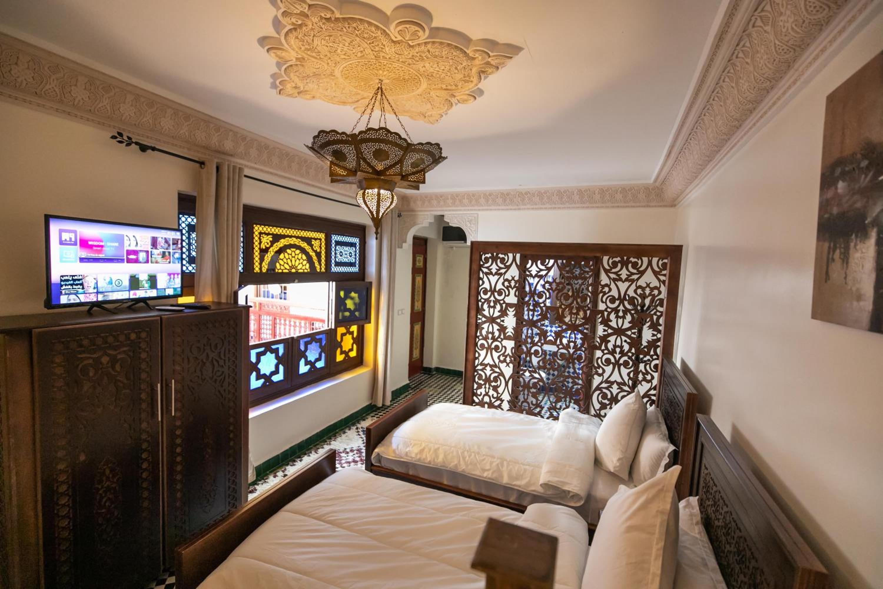 Quadruple Room with Private Bathroom - Photo 7
