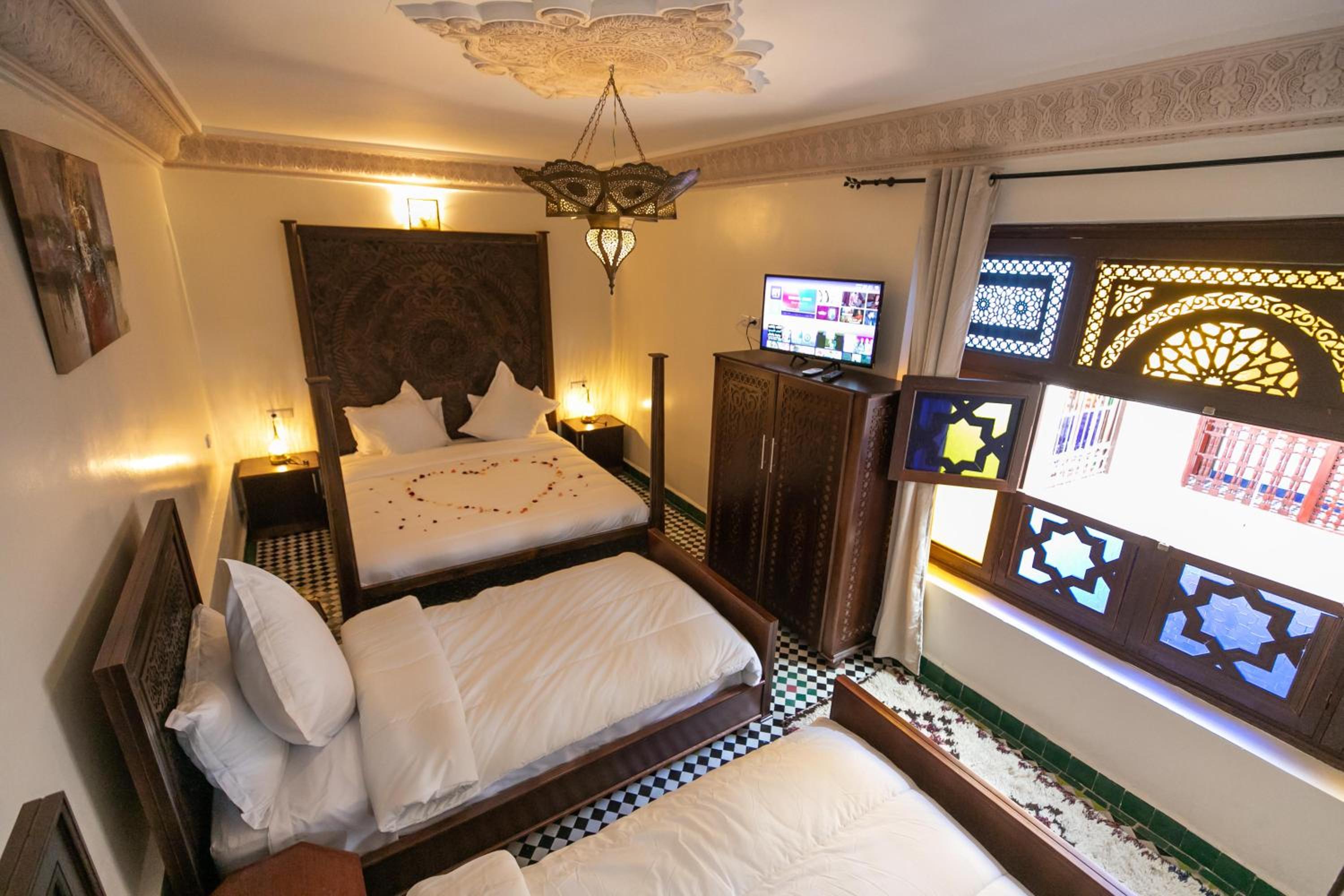 Quadruple Room with Private Bathroom - Photo 1