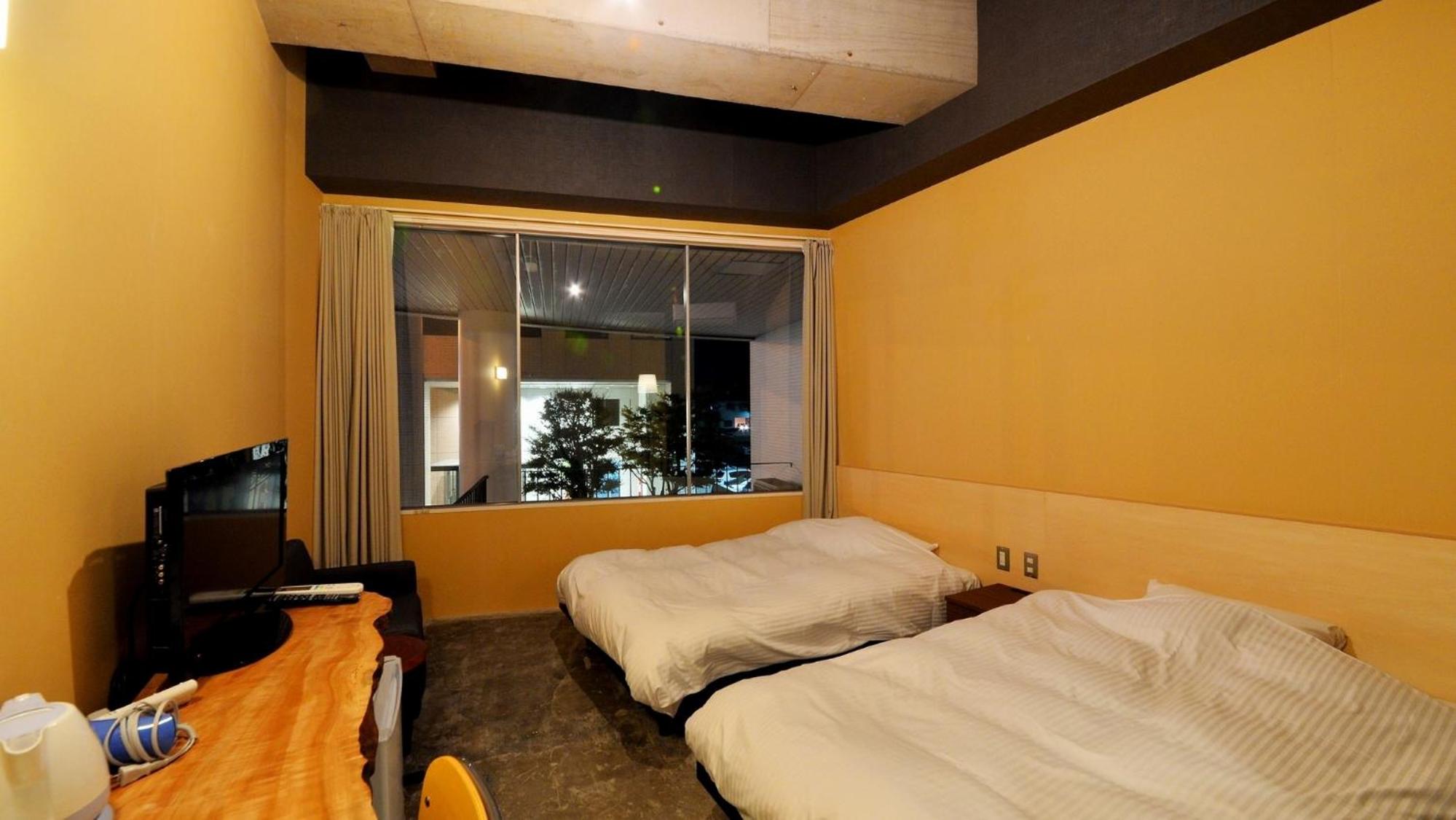 Economy Twin Room - Non-Smoking - Photo 4