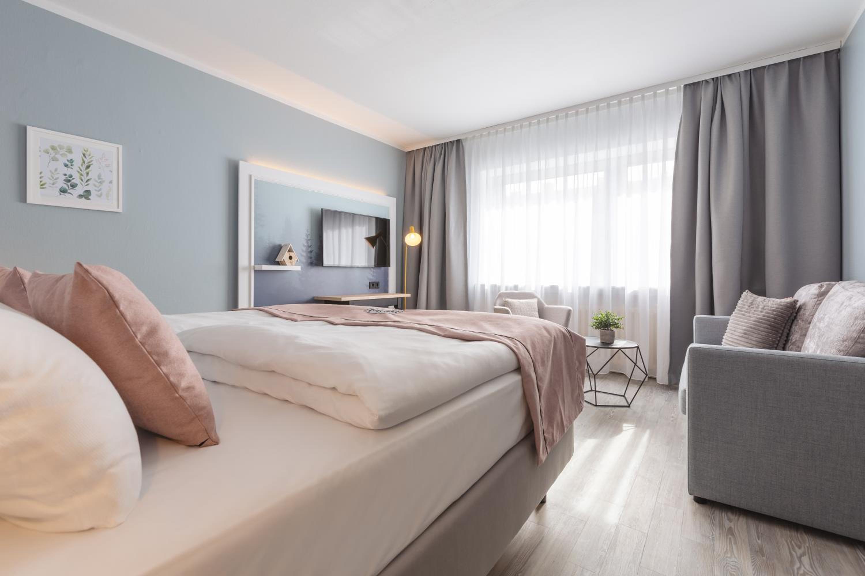 Premium Twin Room with Sofa Bed photo 2