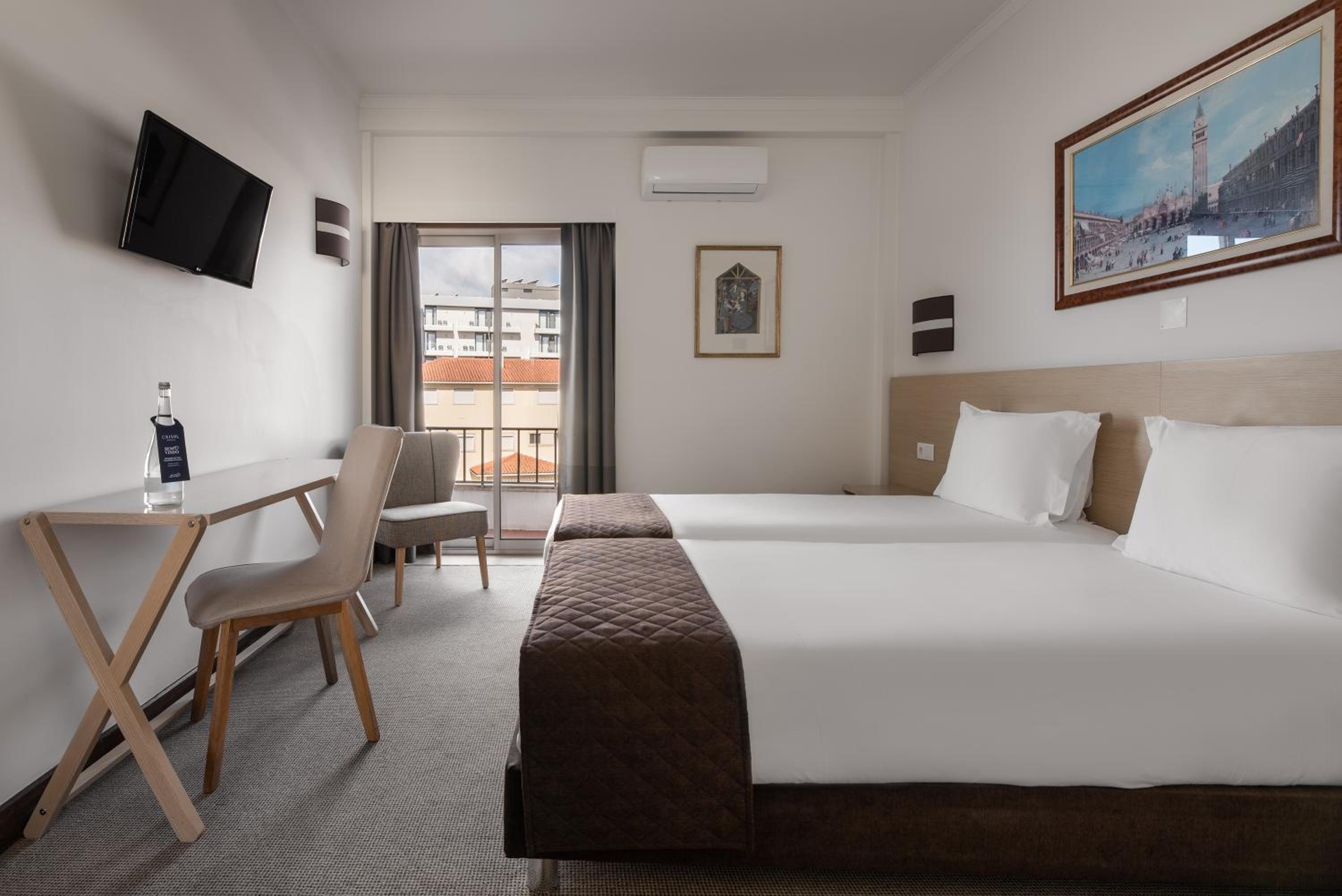 Twin Room with Sanctuary View and Balcony - Photo 1