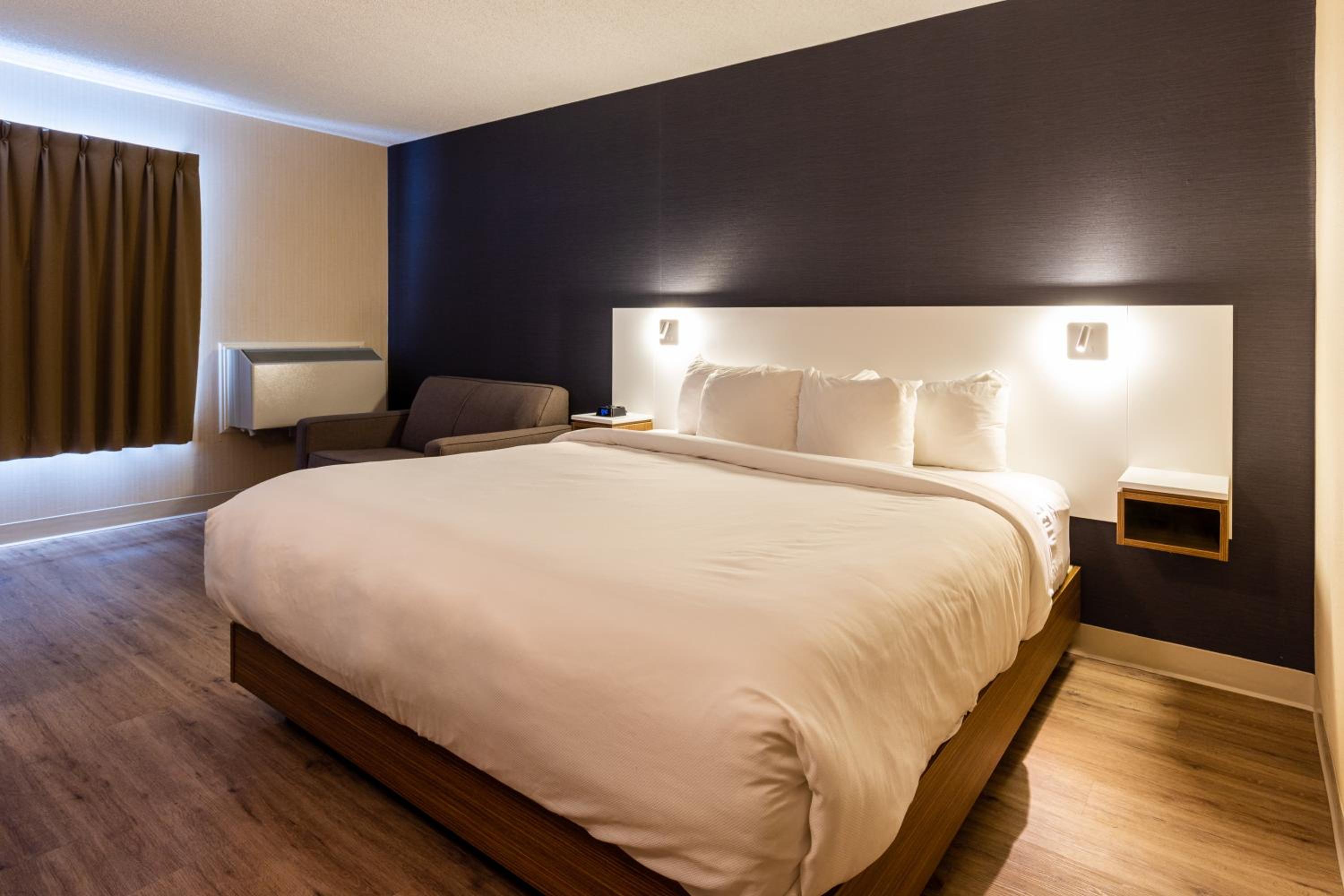 Queen Room with Two Queen Beds - Photo 1