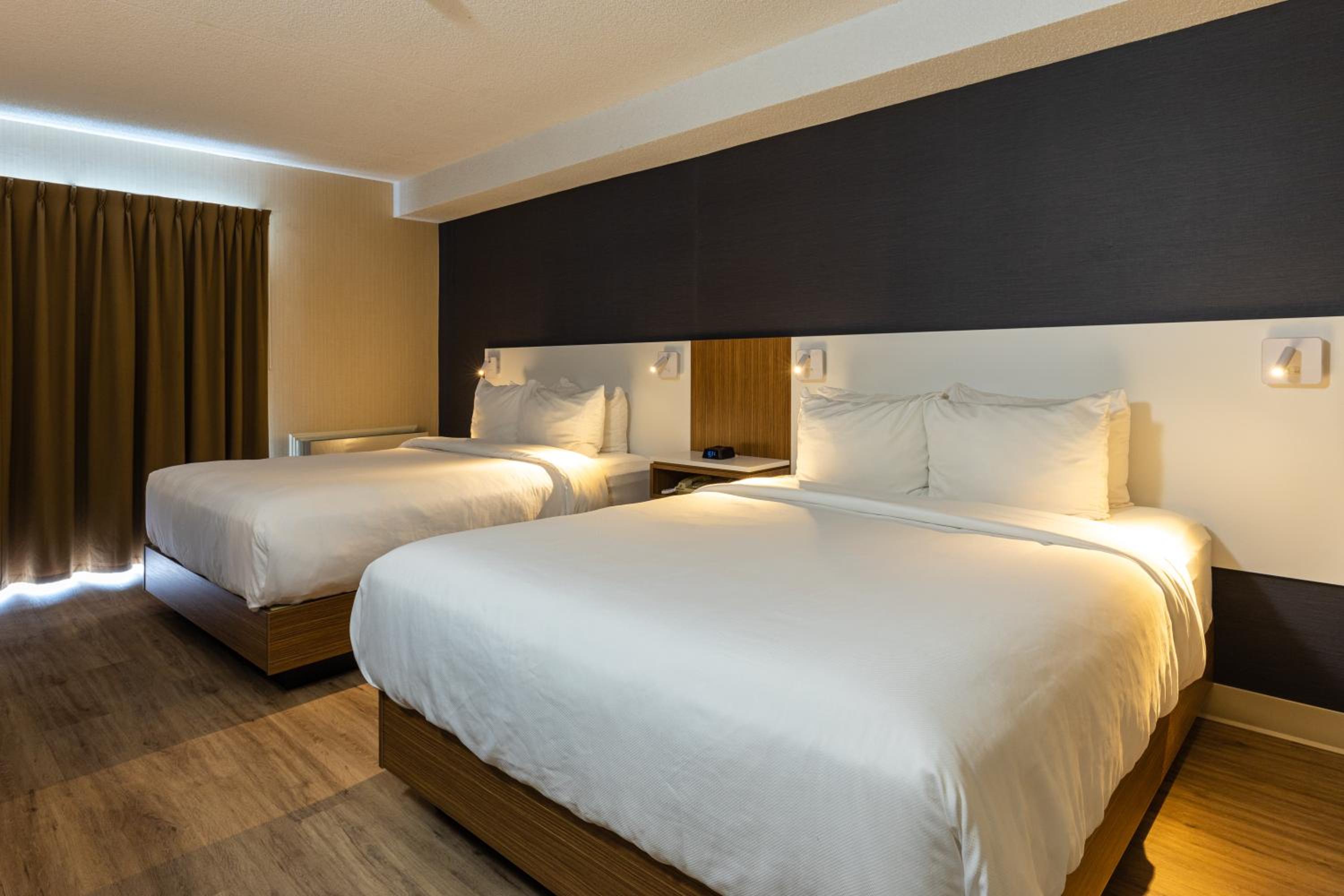 Queen Room with Two Queen Beds, Second Floor - Photo 1