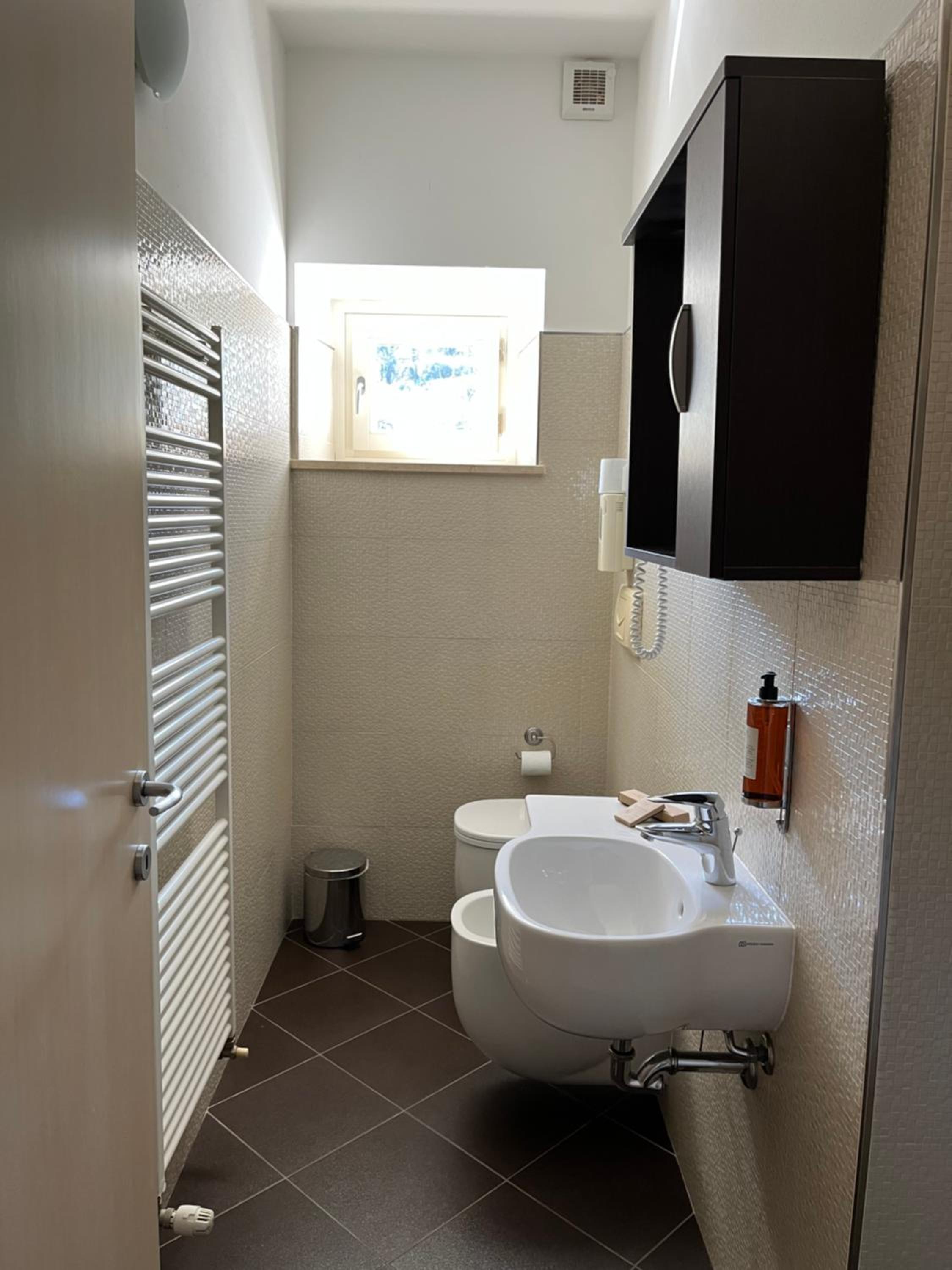 Quadruple Room with Private Bathroom photo 3