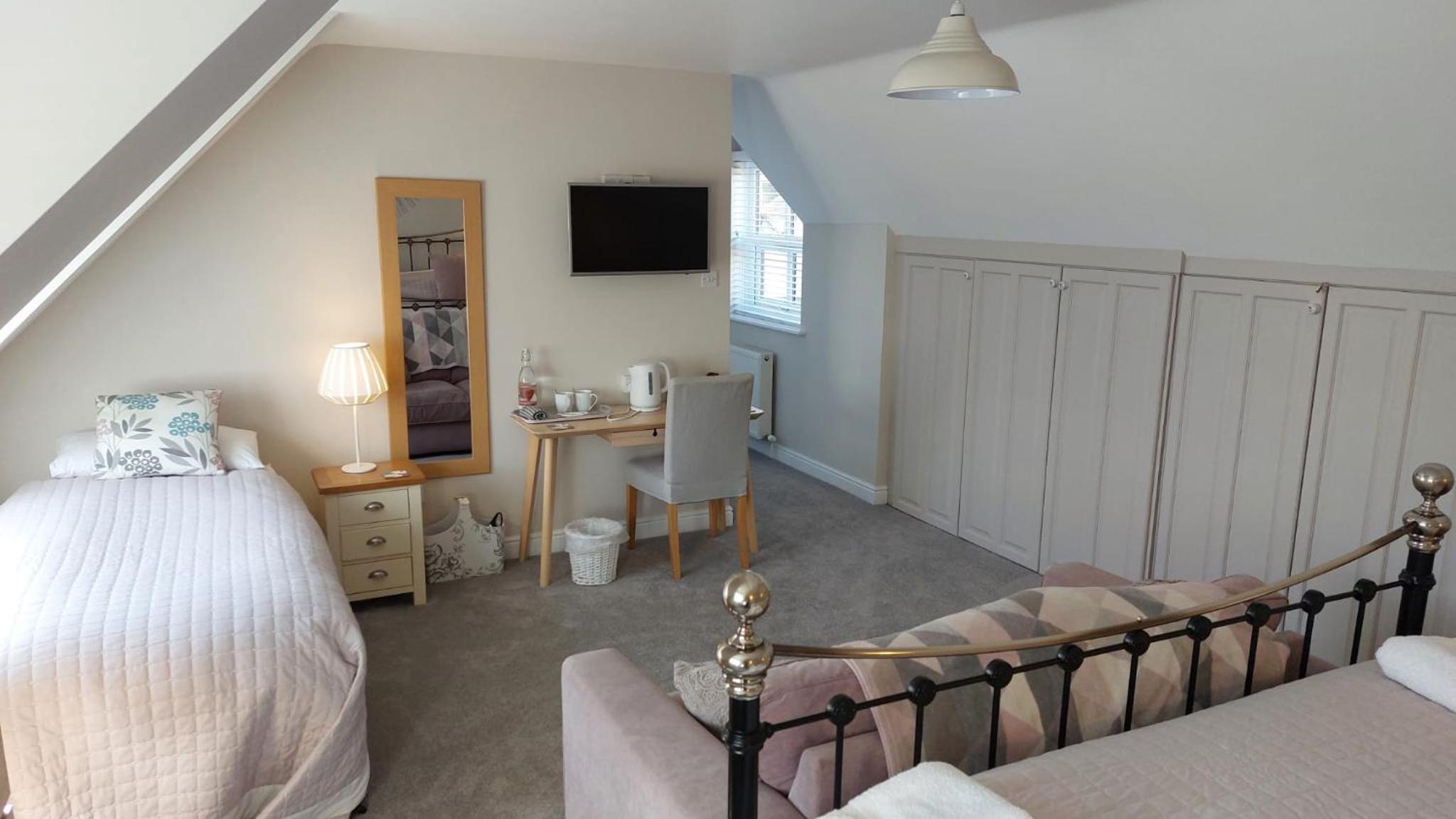 Deluxe Quadruple Room - Photo 7