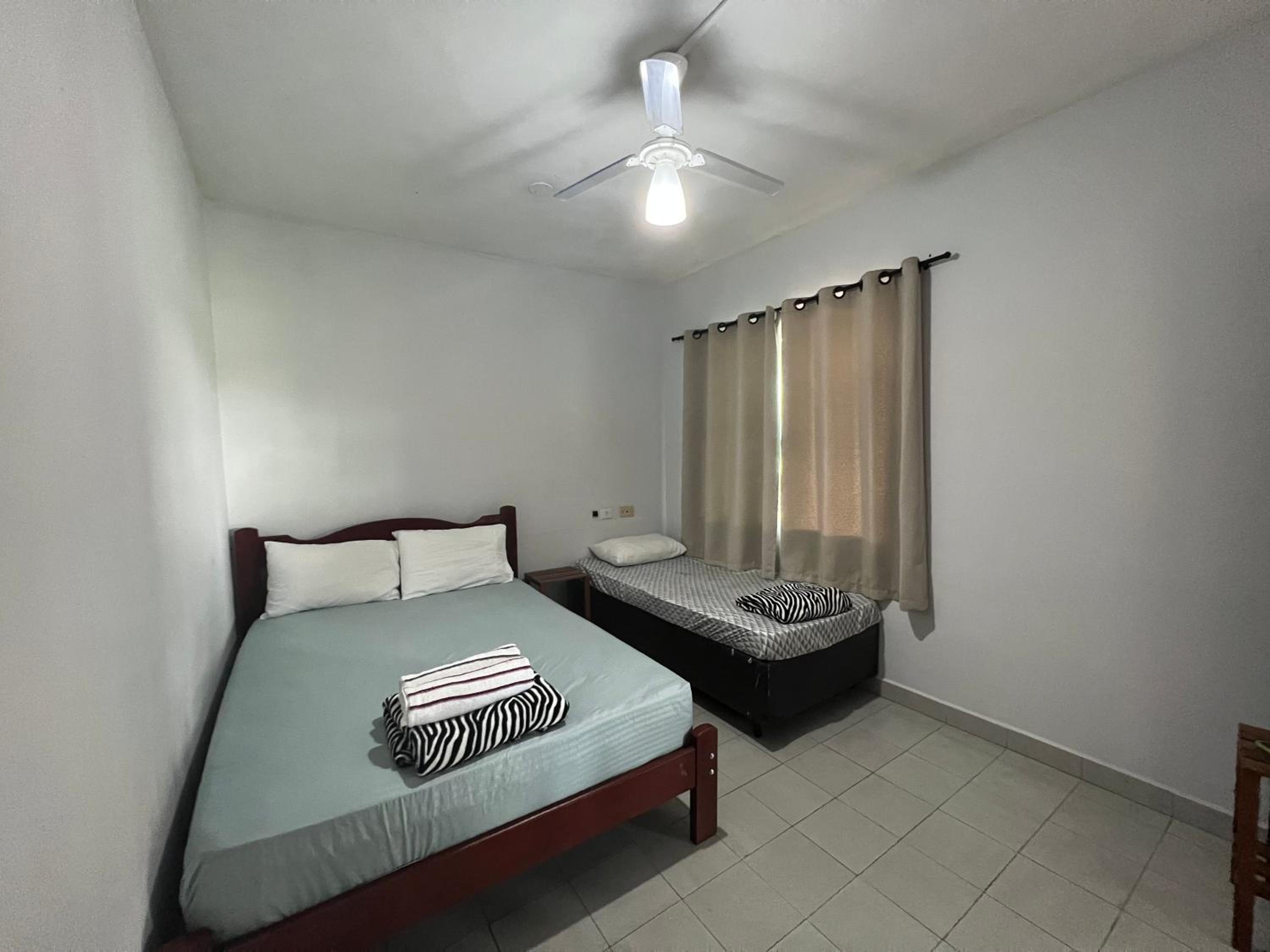 Basic Triple Room with Shared Bathroom photo 1