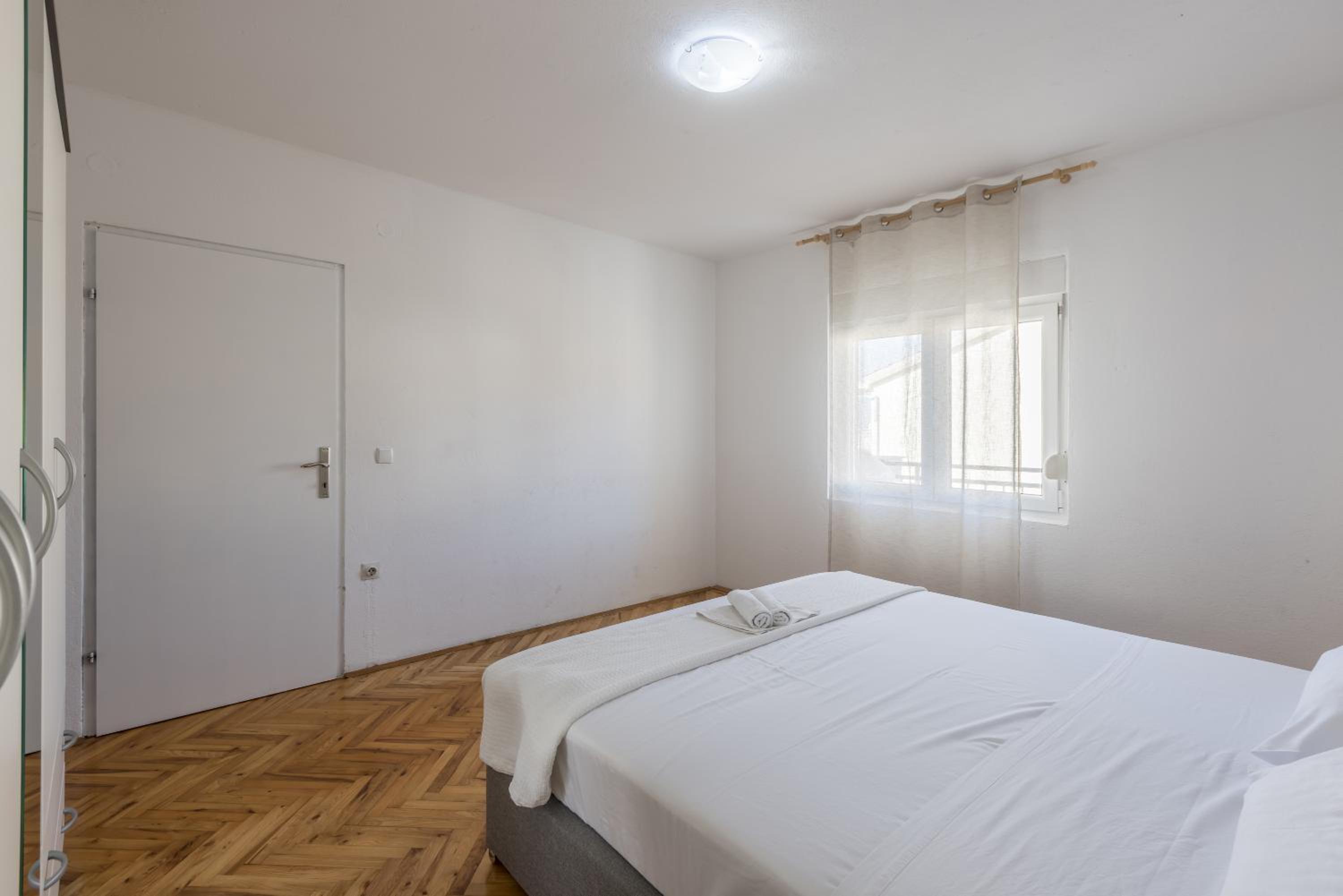 Three-Bedroom Apartment - Photo 10