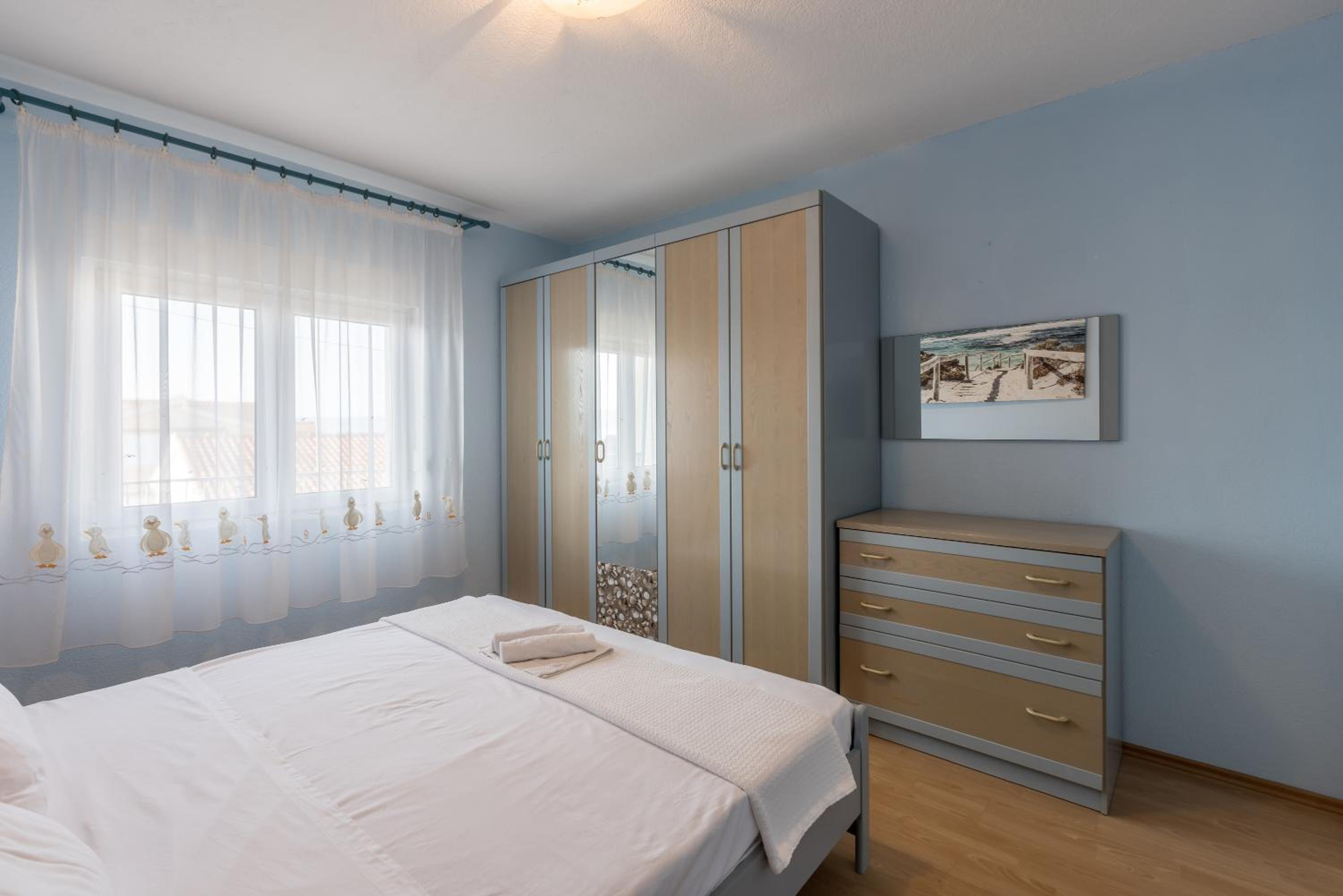 Three-Bedroom Apartment - Photo 14