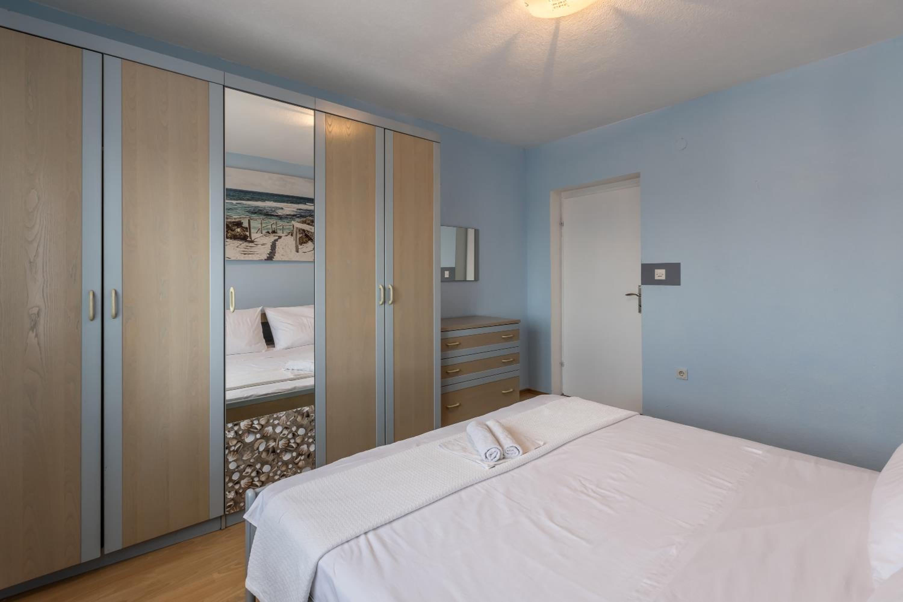 Three-Bedroom Apartment - Photo 13