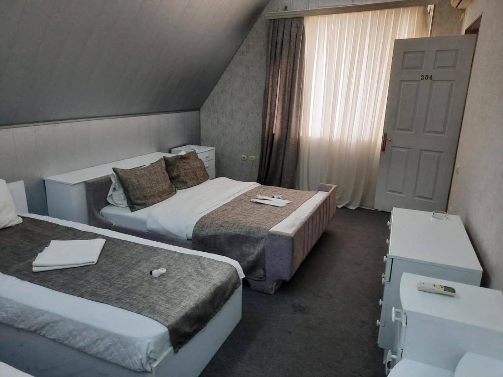 Economy Quadruple Room with Shared Bathroom