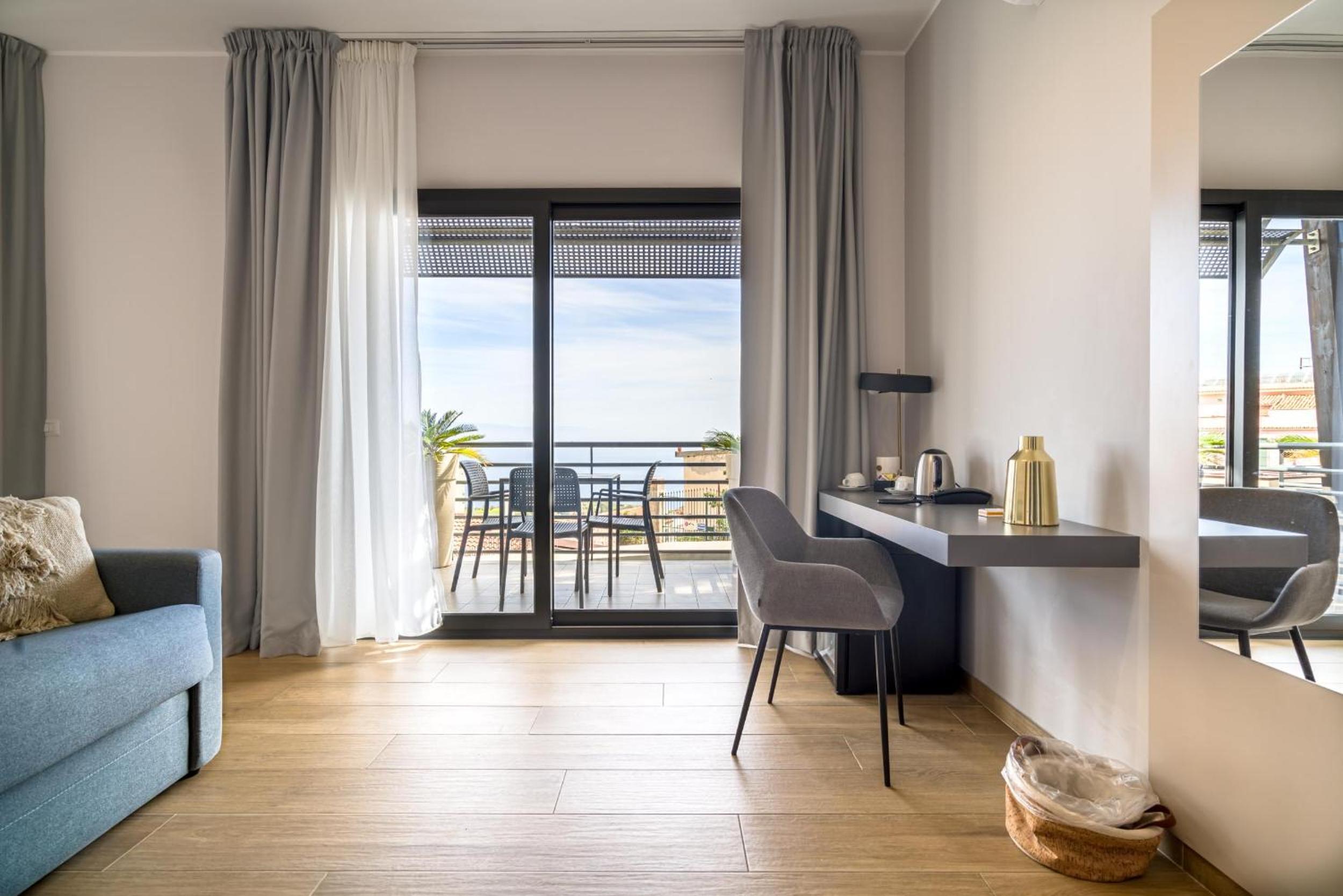 Family Room with Balcony and Partial Sea View