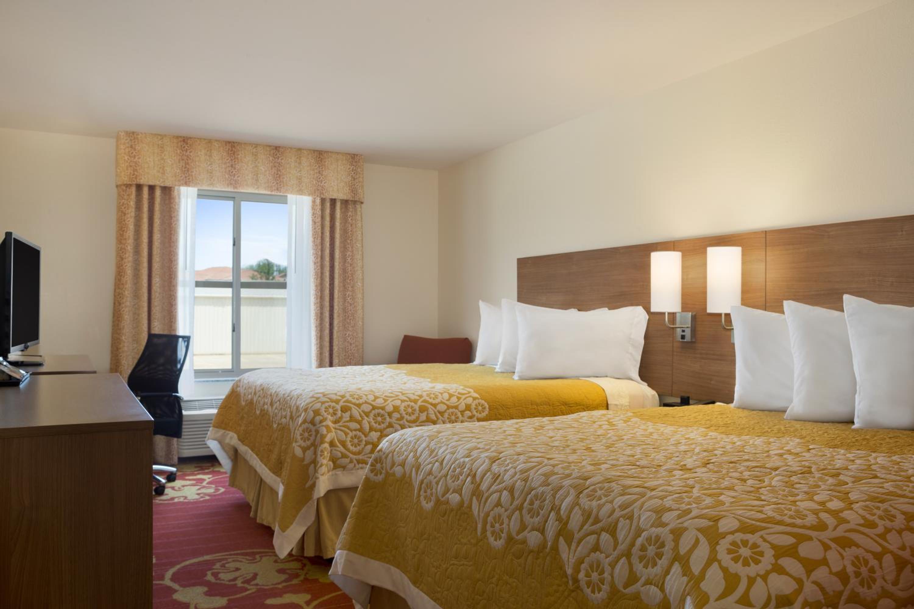 Deluxe Queen Room with Two Queen Beds - Non-Smoking photo 1