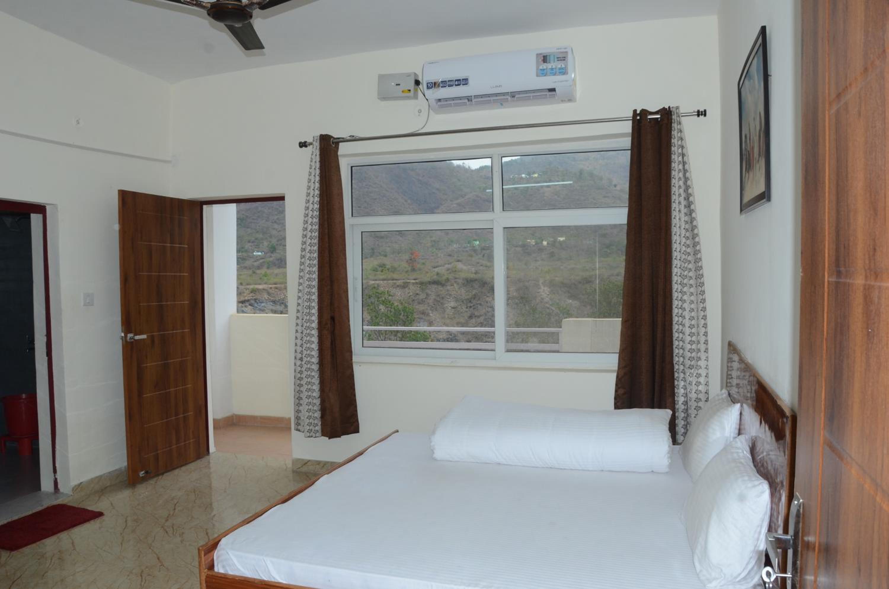 Family Room with Balcony - Photo 1
