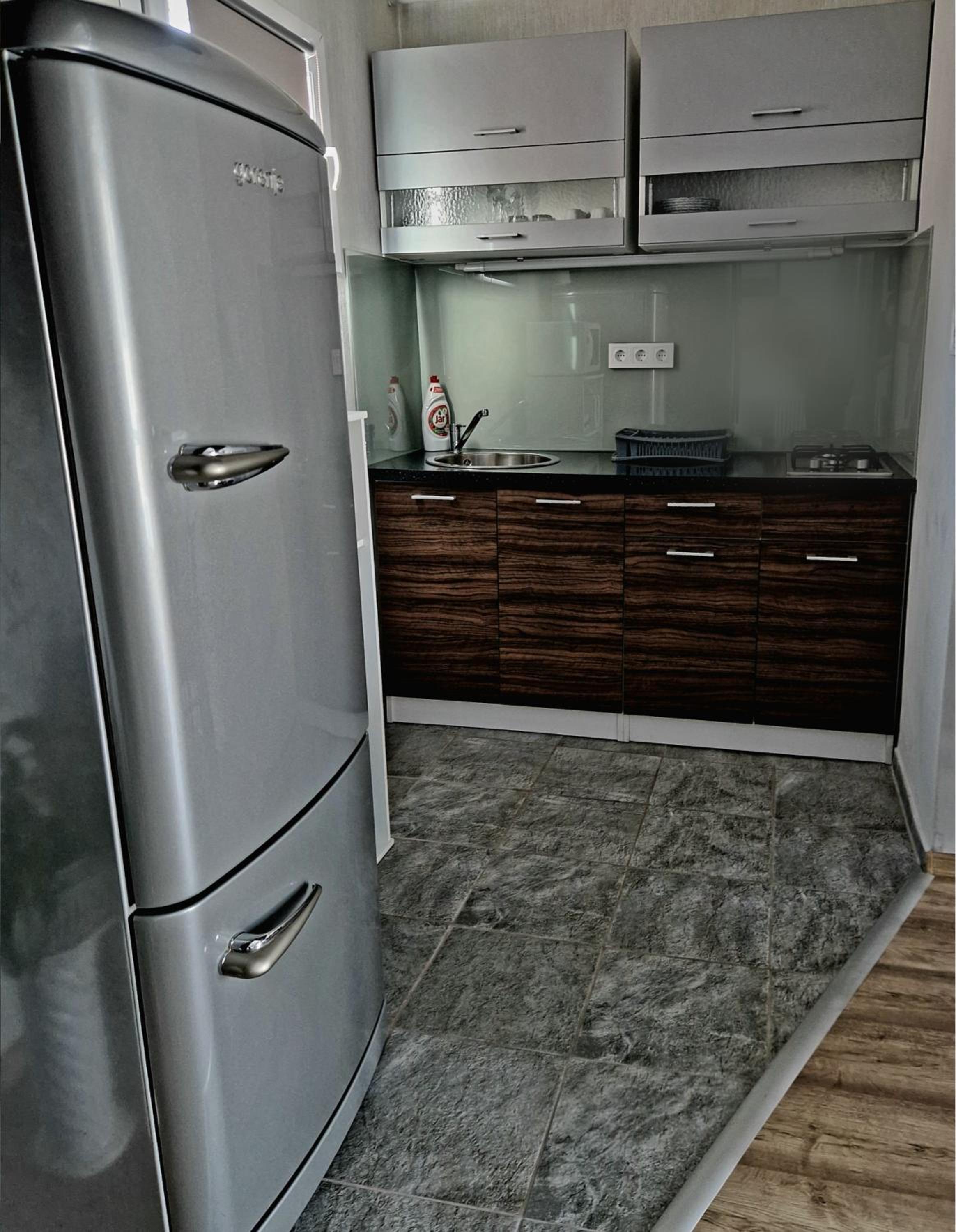 Three-Bedroom House - Photo 18