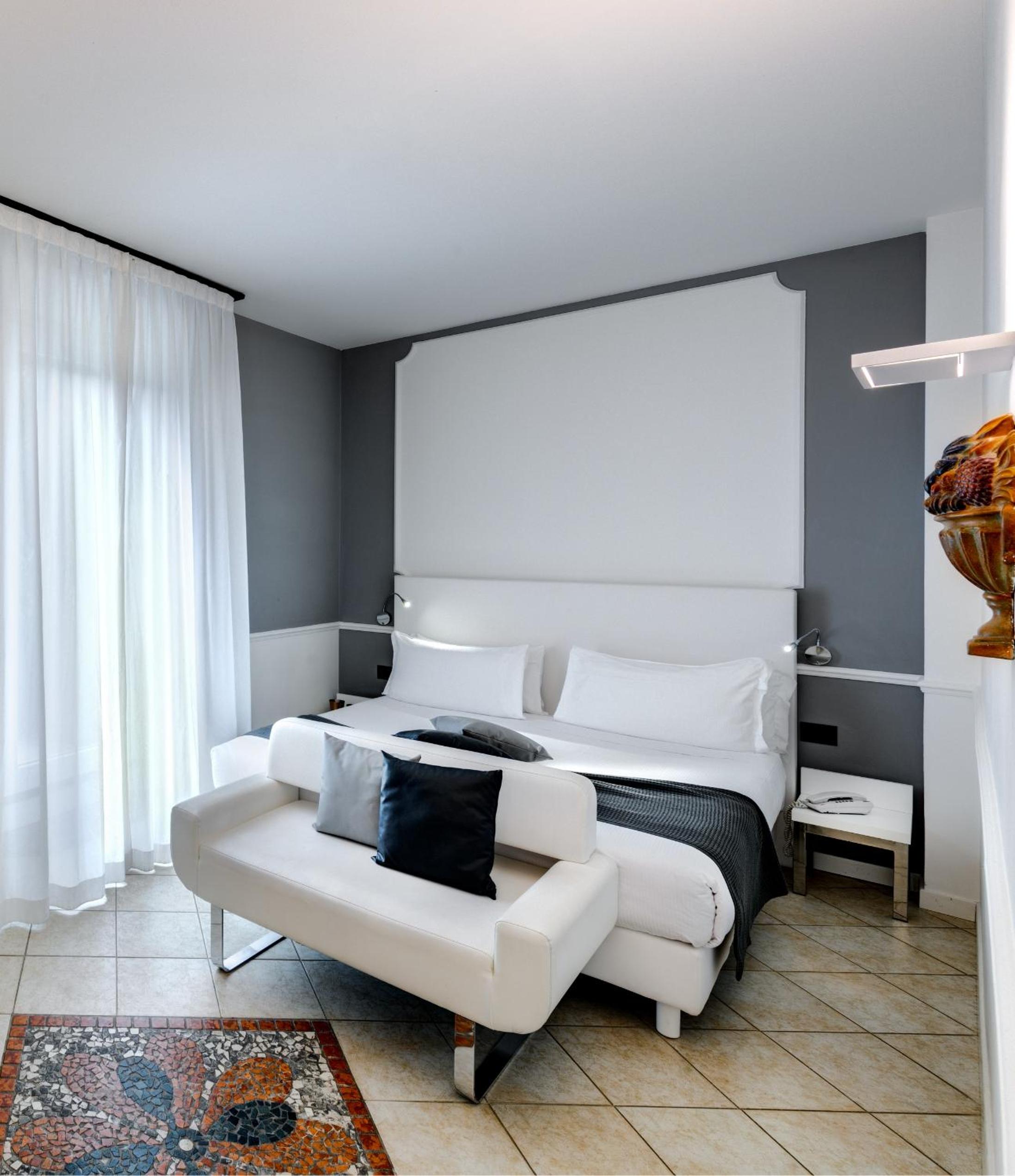 Experience comfort in our modern hotel room retreat.