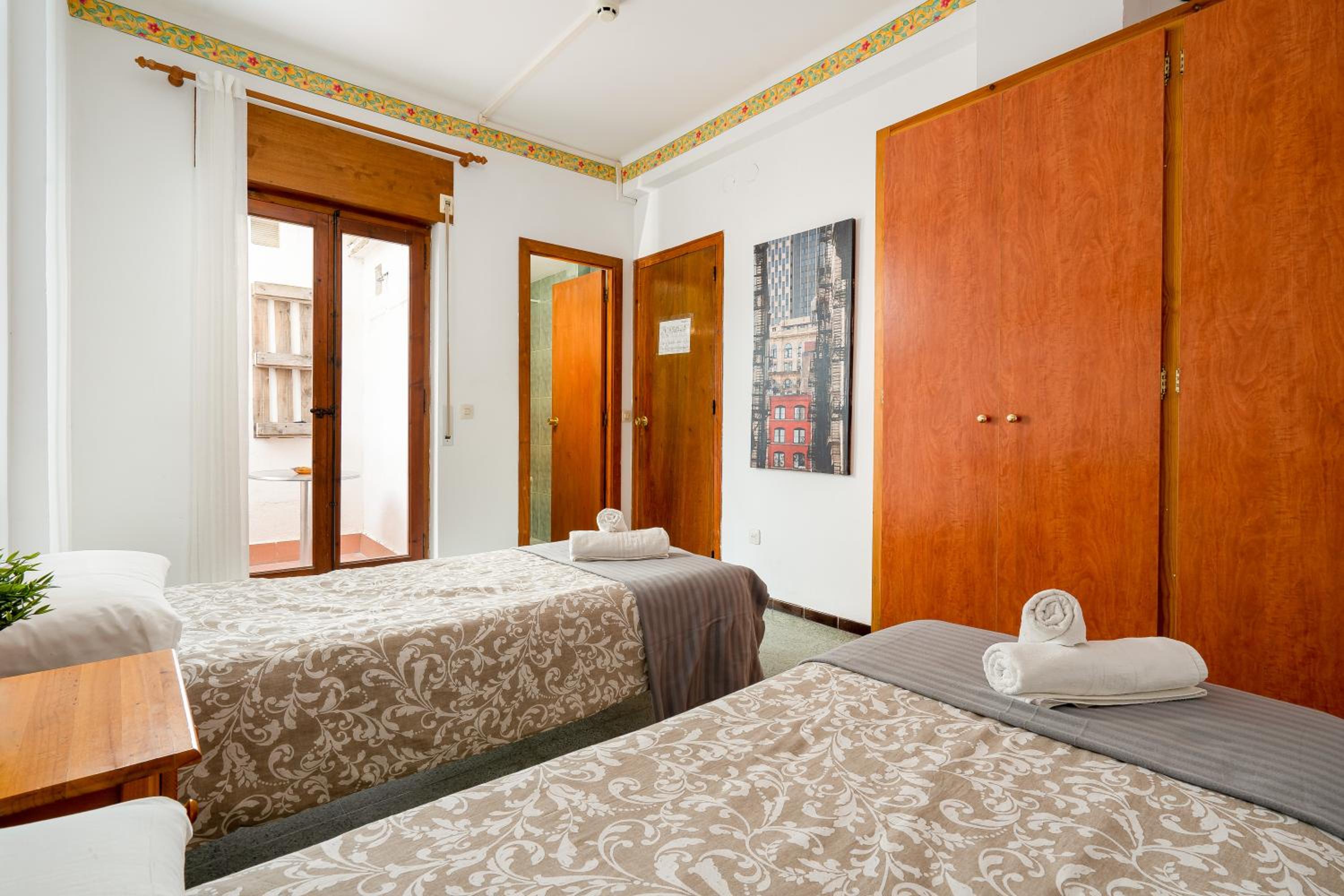 Habitación Triple con Balcón
